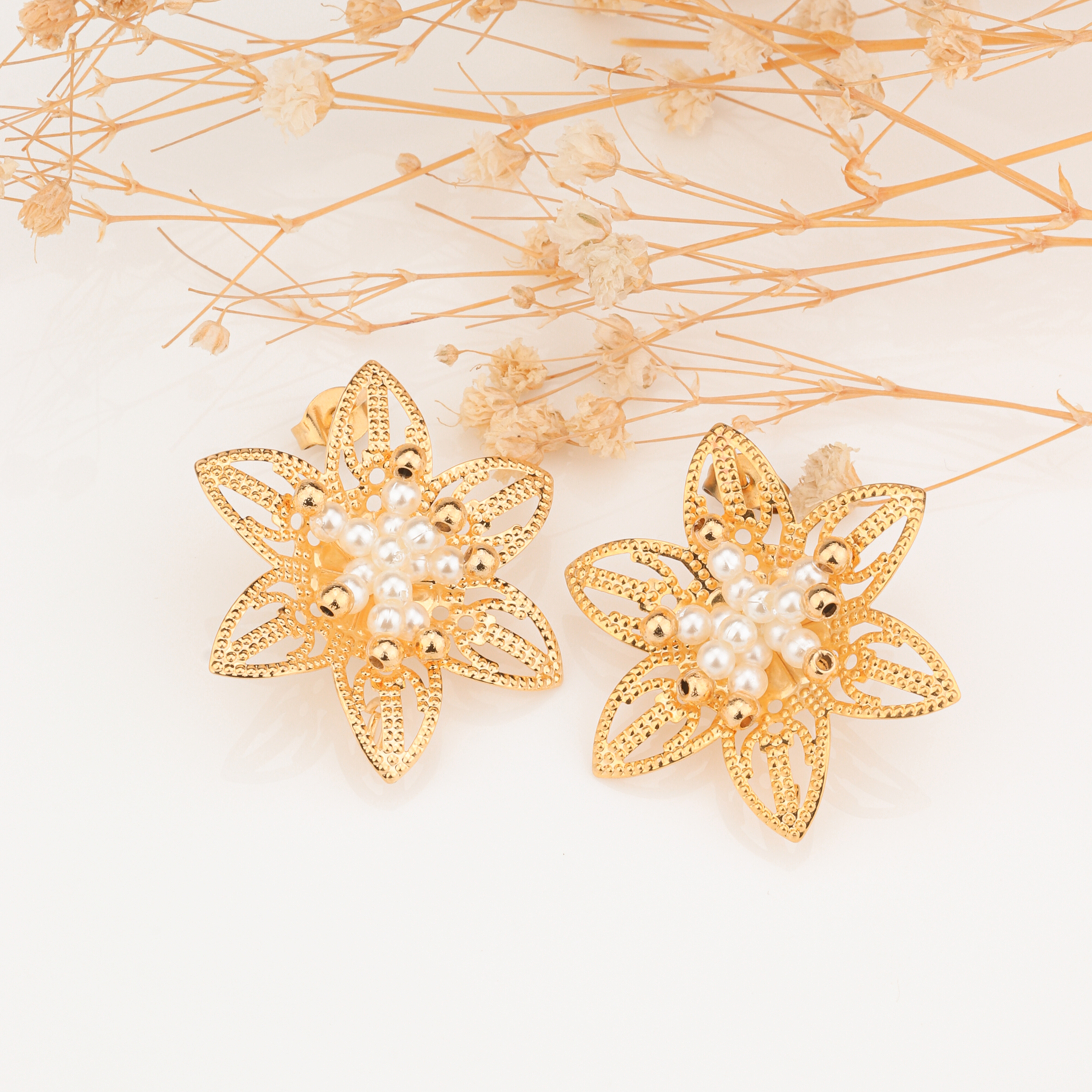 Aretes de flor  en acero