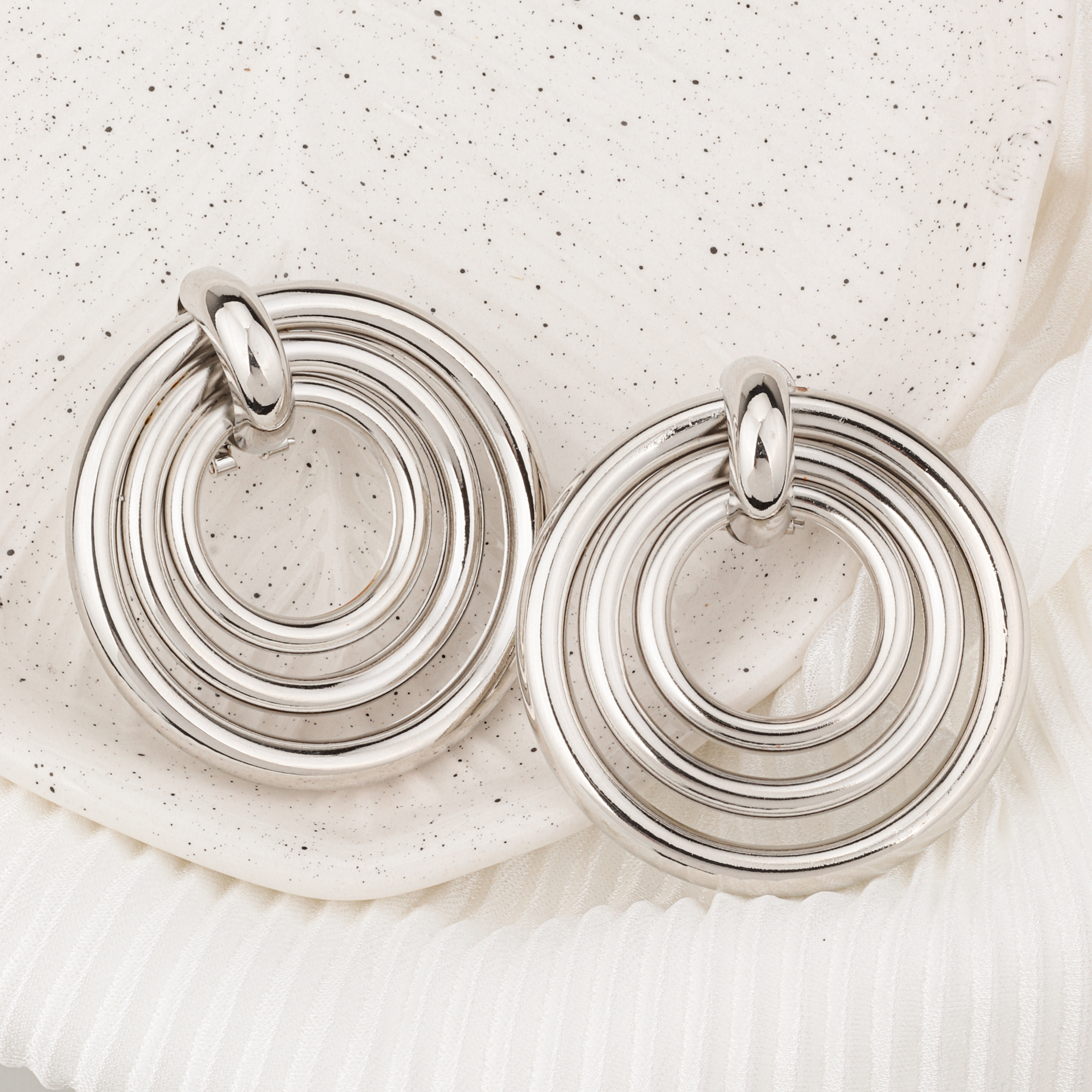 Aretes en rodio