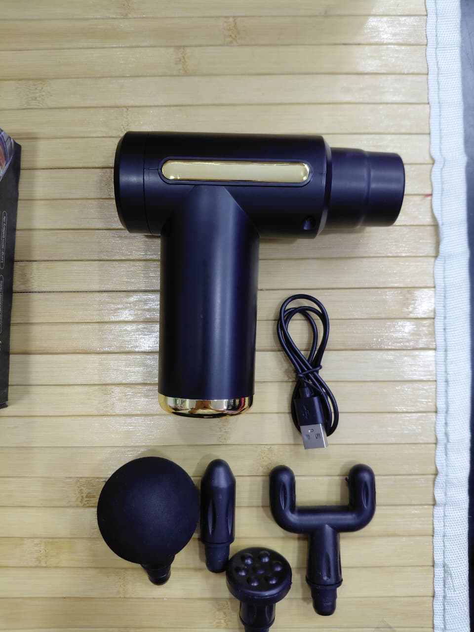 Pistola de Masaje Muscular