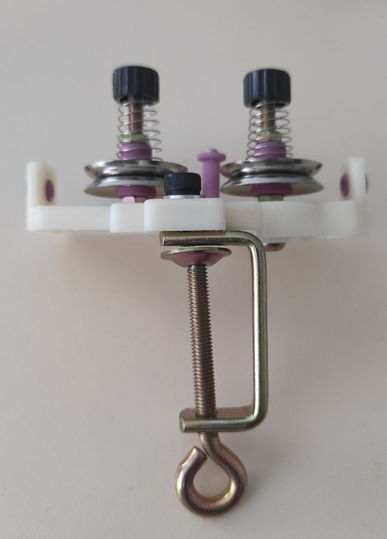 Натягувач для пряжі