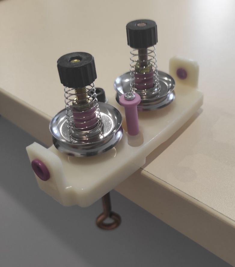 Натягувач для пряжі