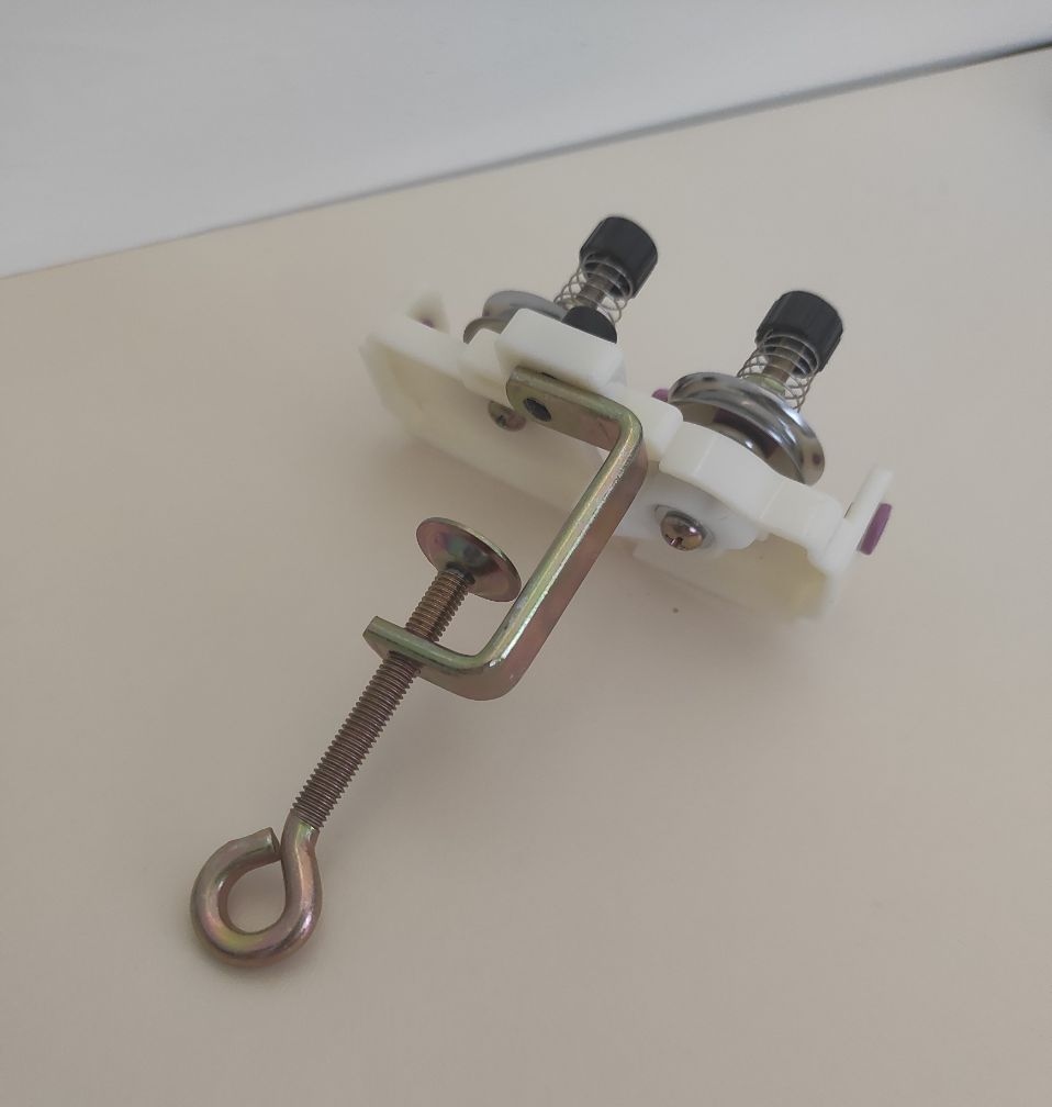 Натягувач для пряжі