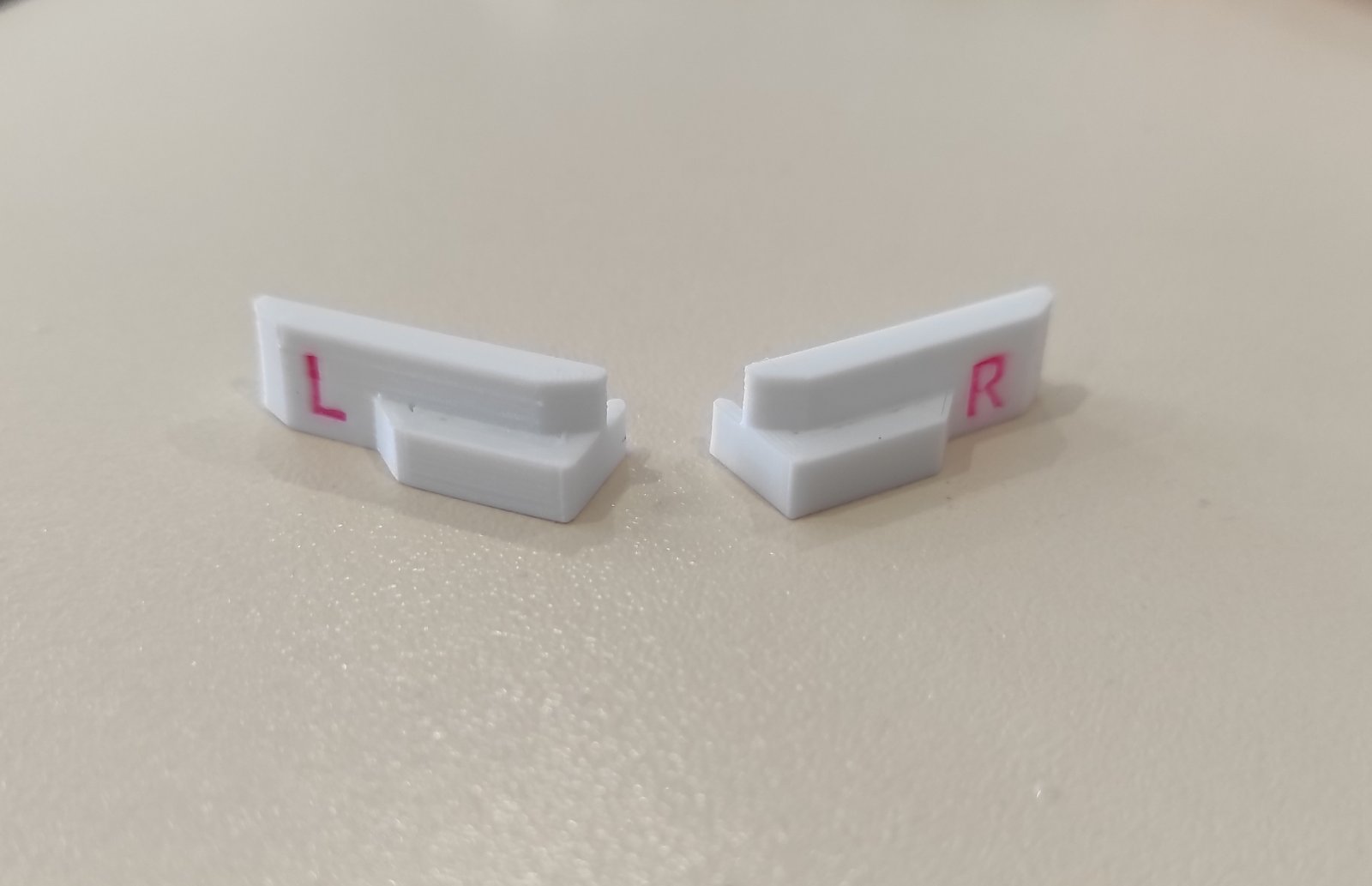 Обмежувачі холостого ходу робот каретки brother KG 88,89,93,95 пара L та R Ціна вказана за пару