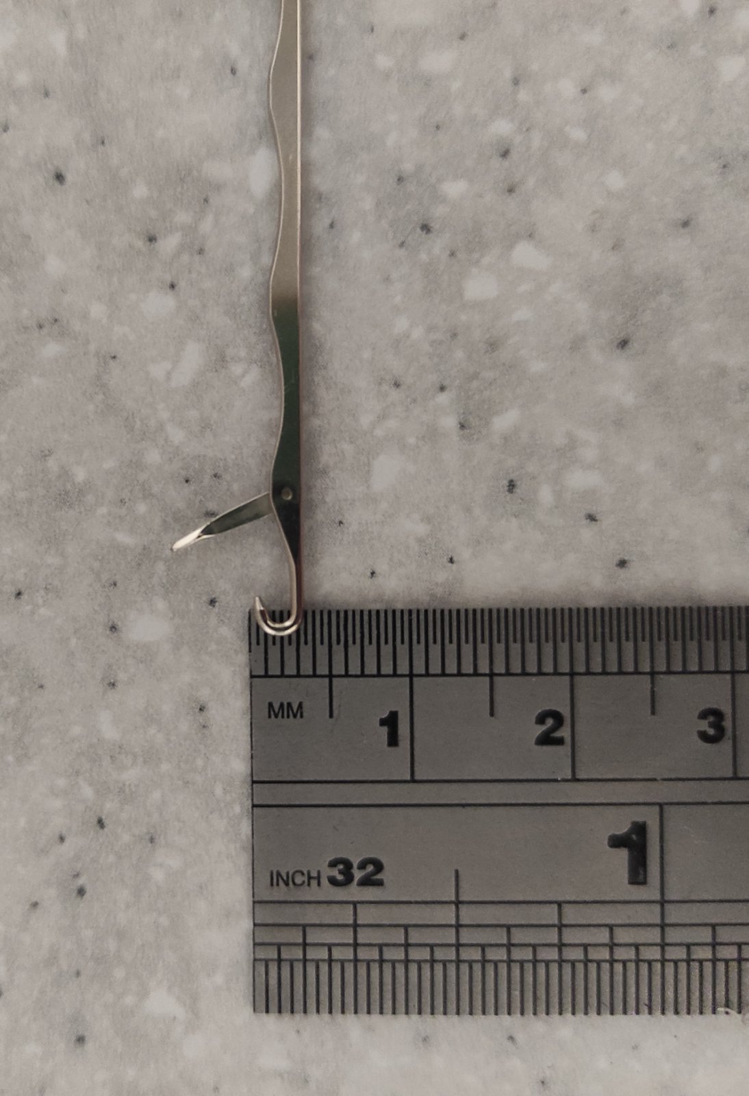 Подвійний петлеулавлювач для лицьових і зворотних петель