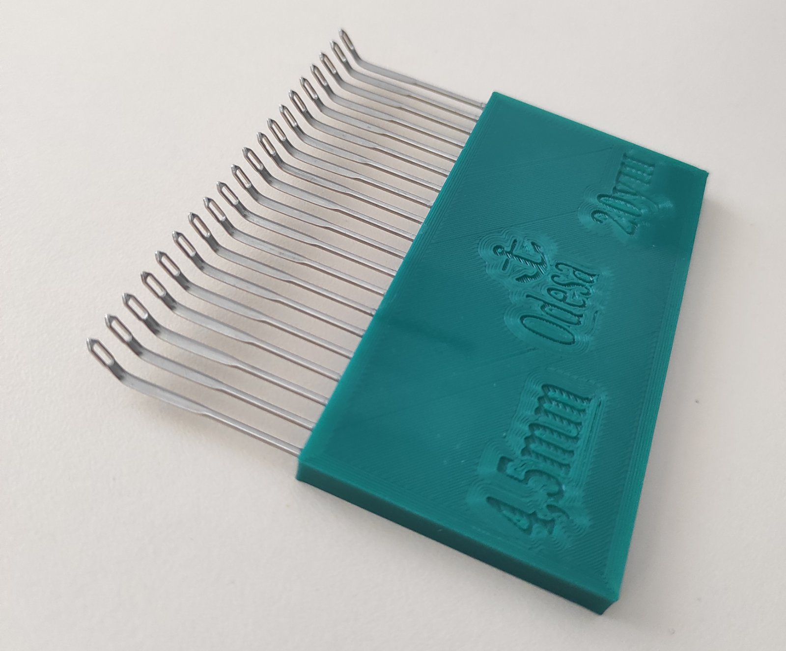 Деккер 20-вушковий з гнутими голками для в’язальних машин 5 класу (4,5 мм).