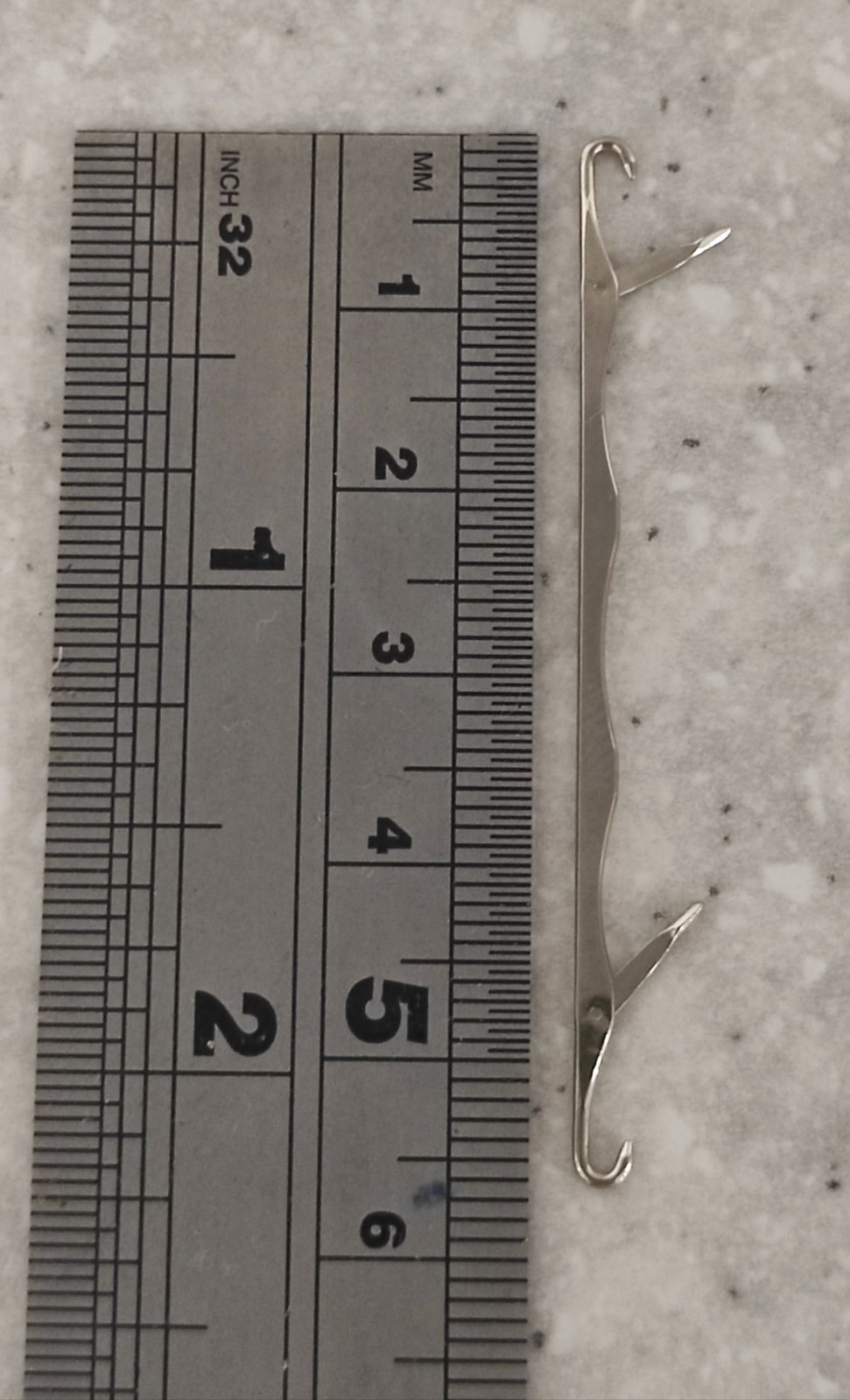 Подвійний петлеулавлювач для лицьових і зворотних петель