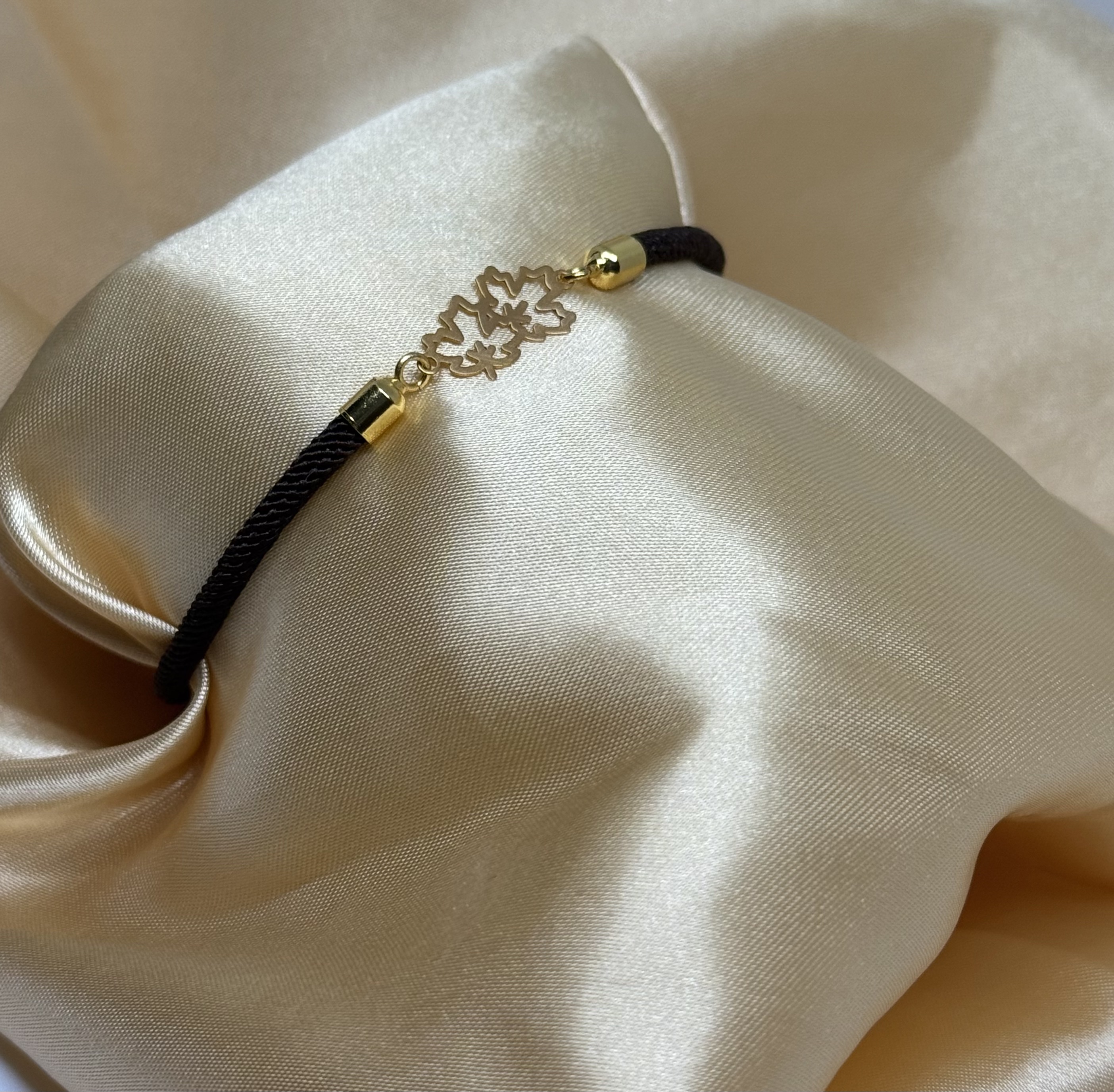 Lien | 18 karat | 2 små bladmotiv