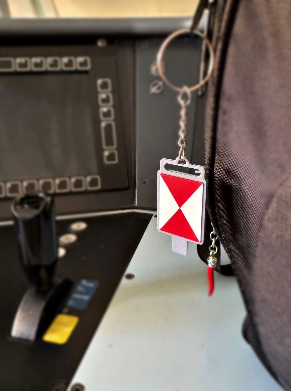 Llavero cartelón de cola ferroviario