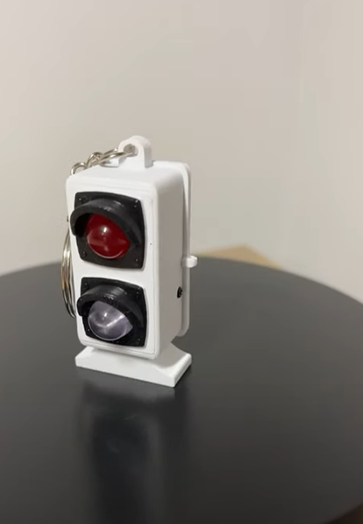 Llavero señal ferroviaria mono bajo