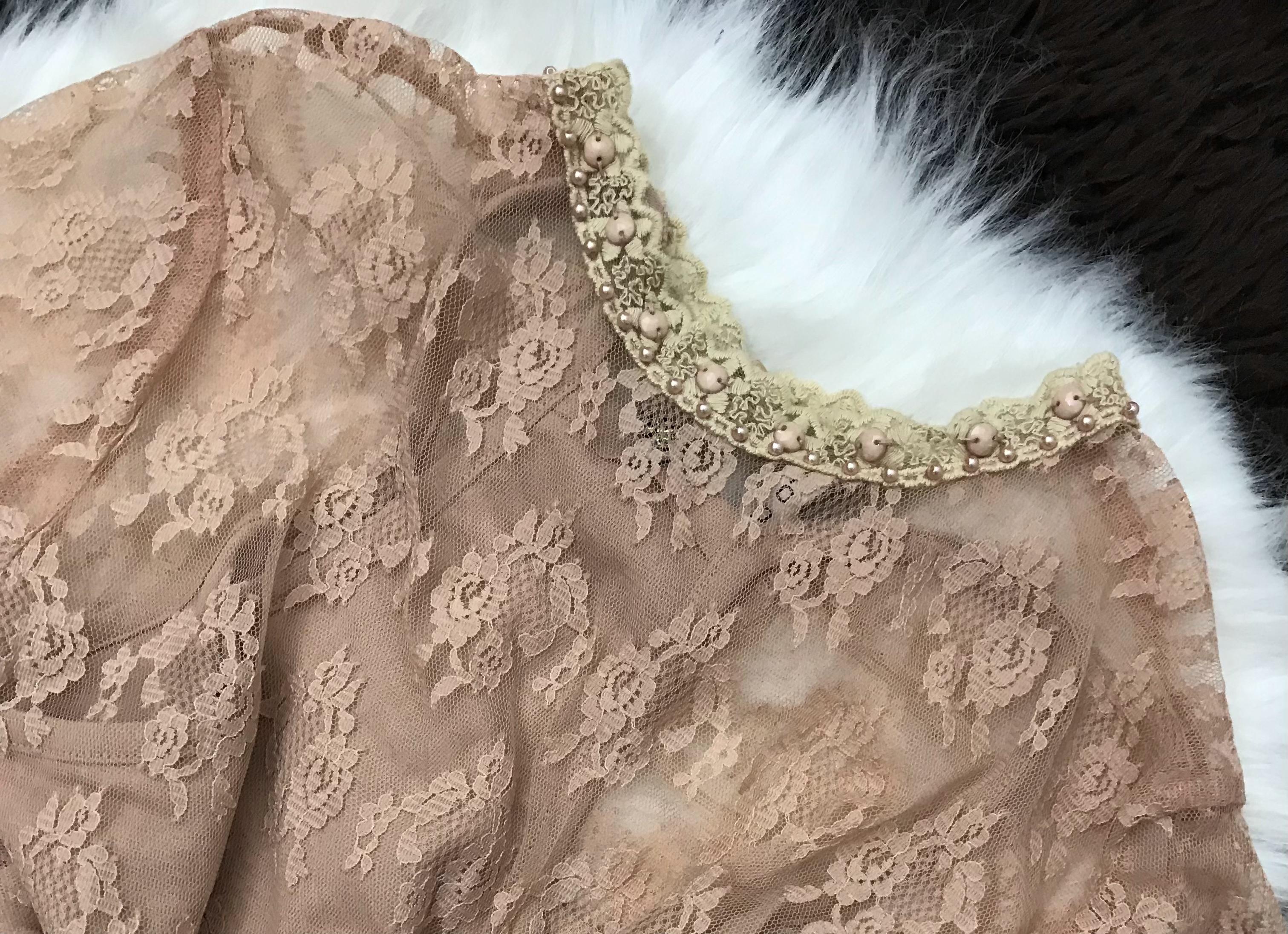 Blusa com renda delicada Tamanho M