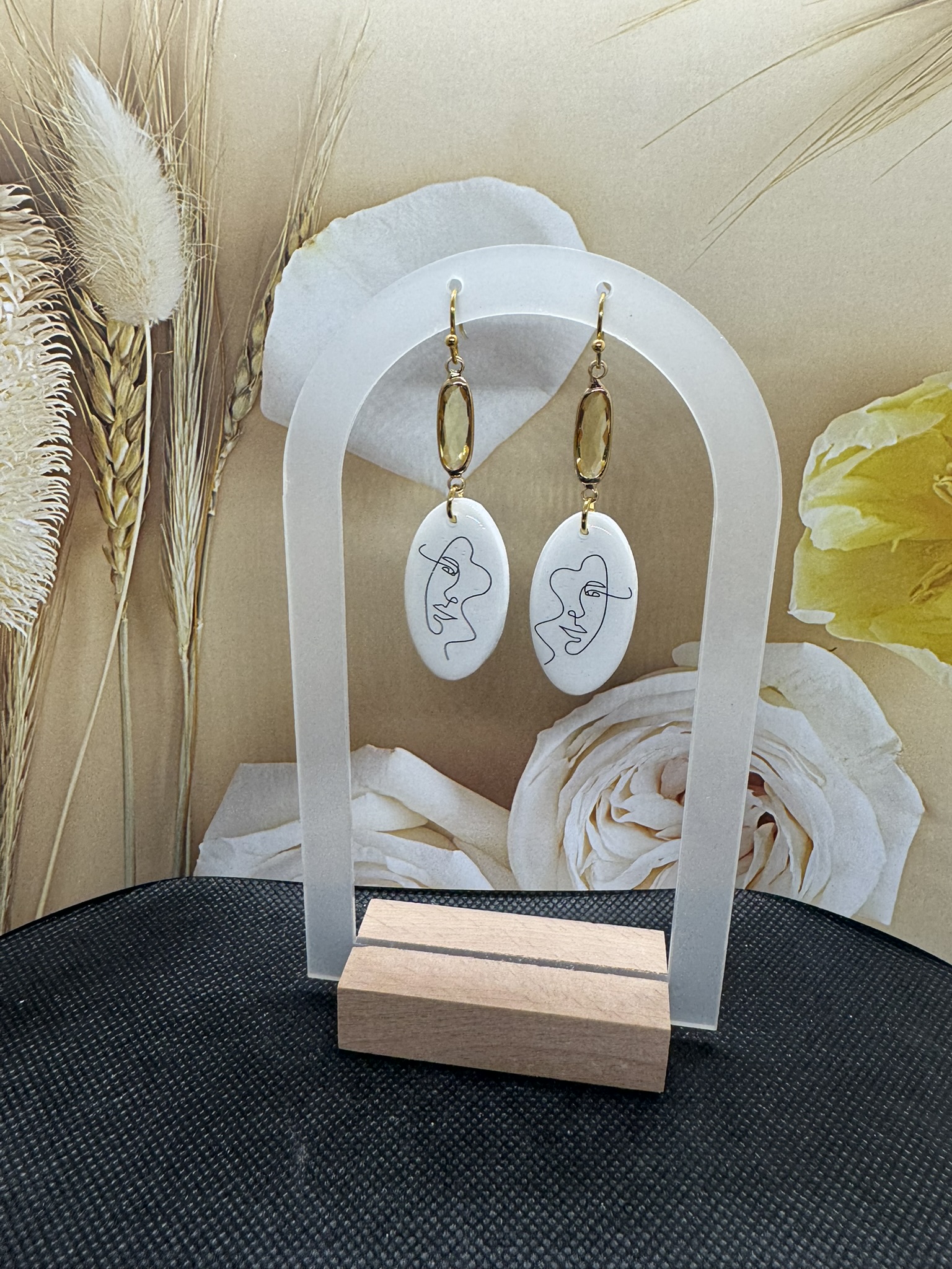 Abstract Face Earrings and Cushion Cut Glass Bead