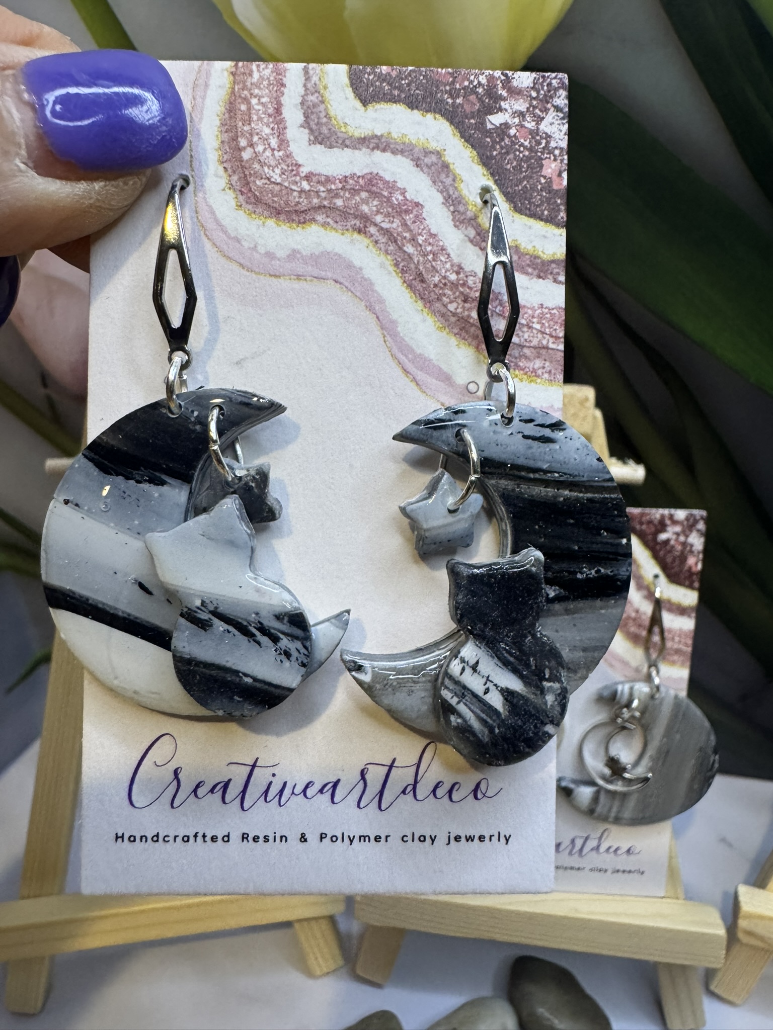 Faux stone clay cat on the moon and moon charm dangles