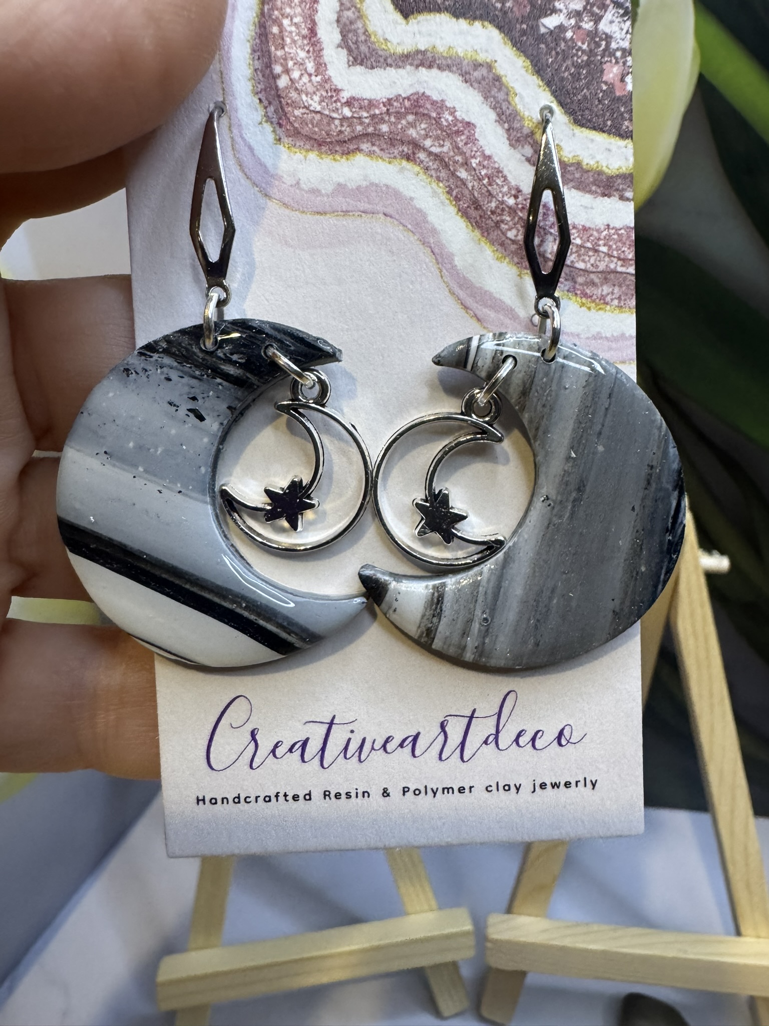 Faux stone clay cat on the moon and moon charm dangles