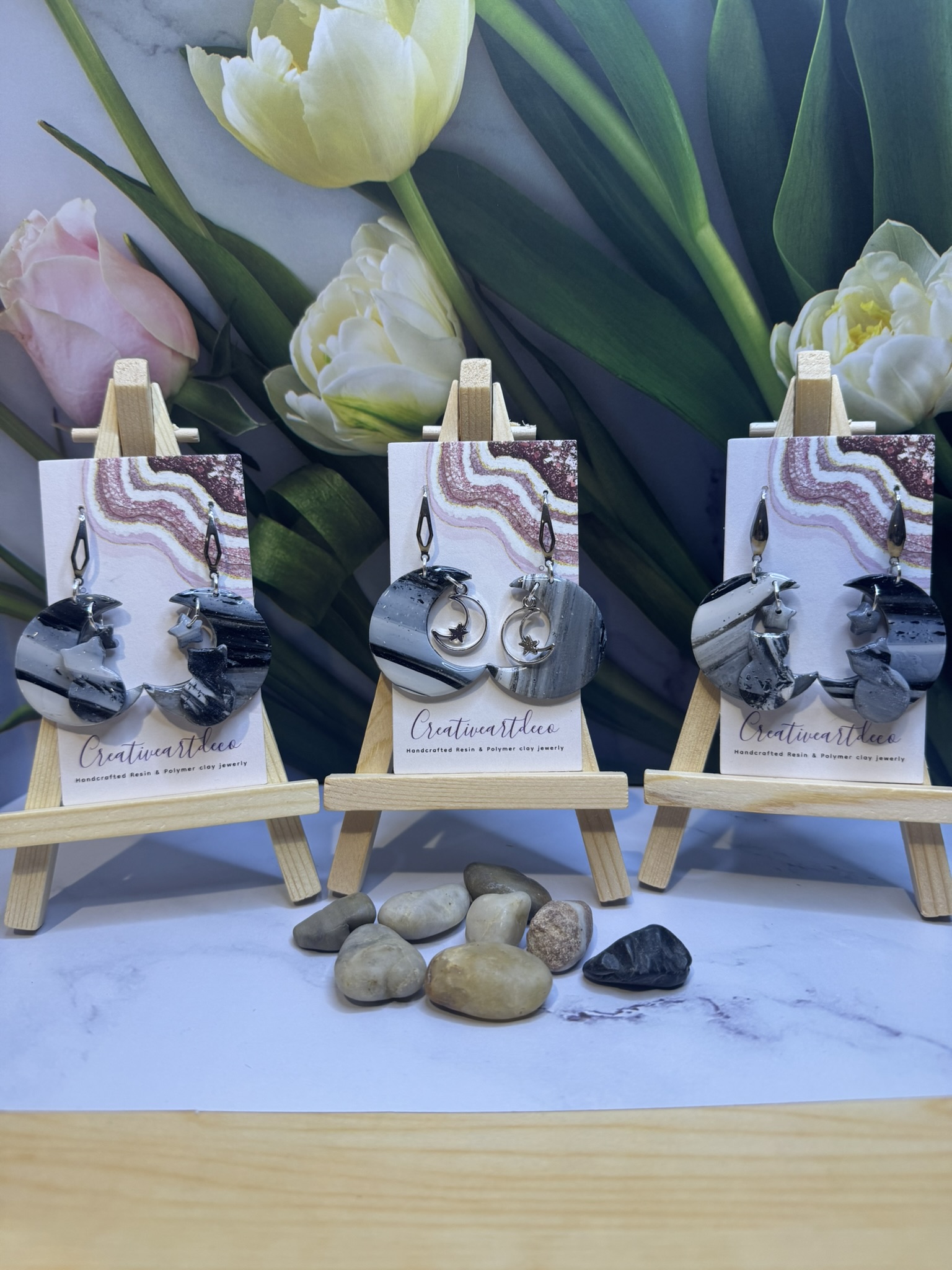 Faux stone clay cat on the moon and moon charm dangles