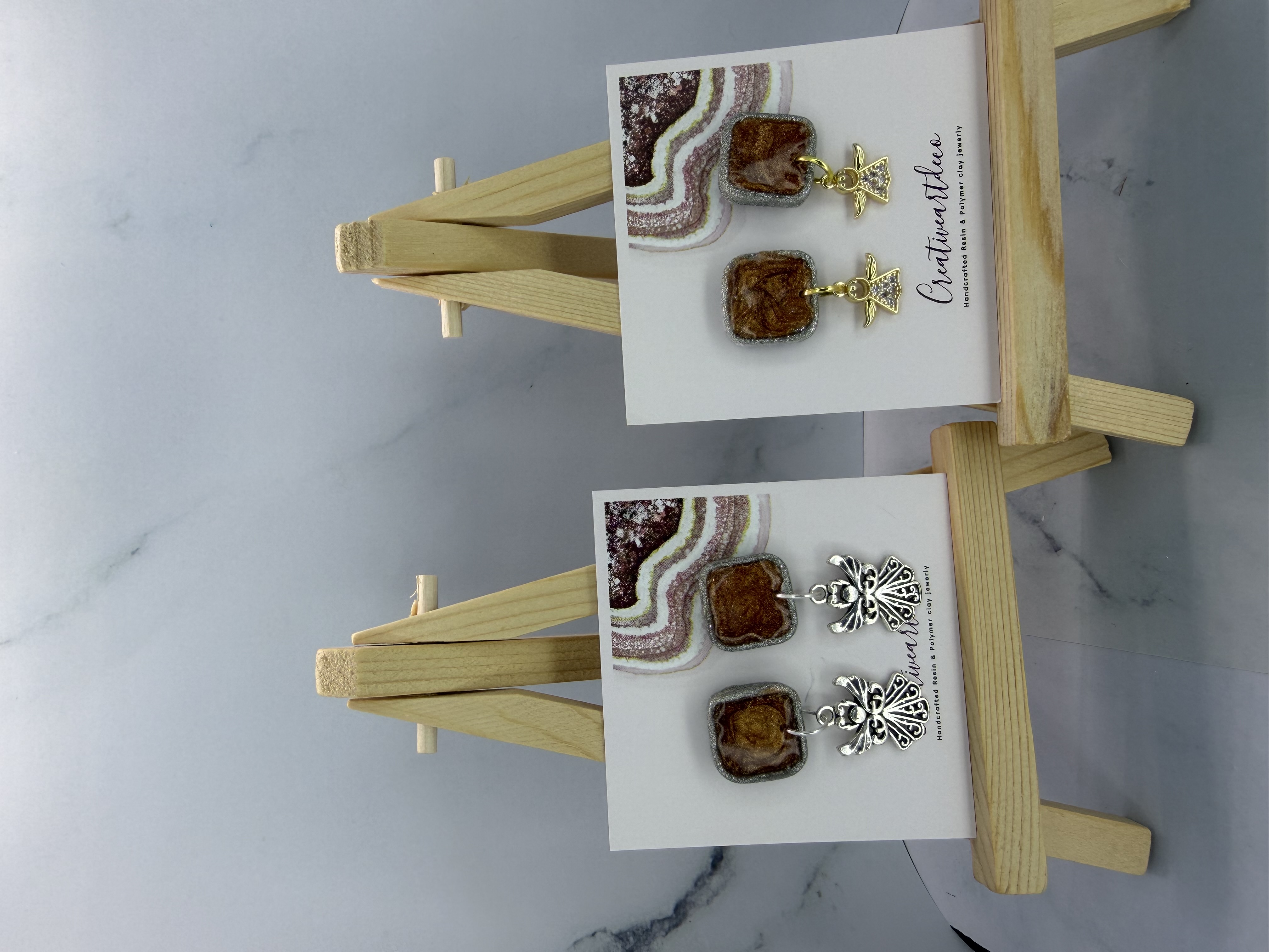 Silver clay bezel with Copper Resin Angel studs