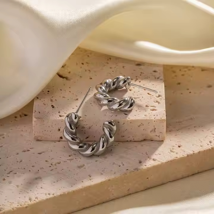 Brincos Argola torcida - Prateado