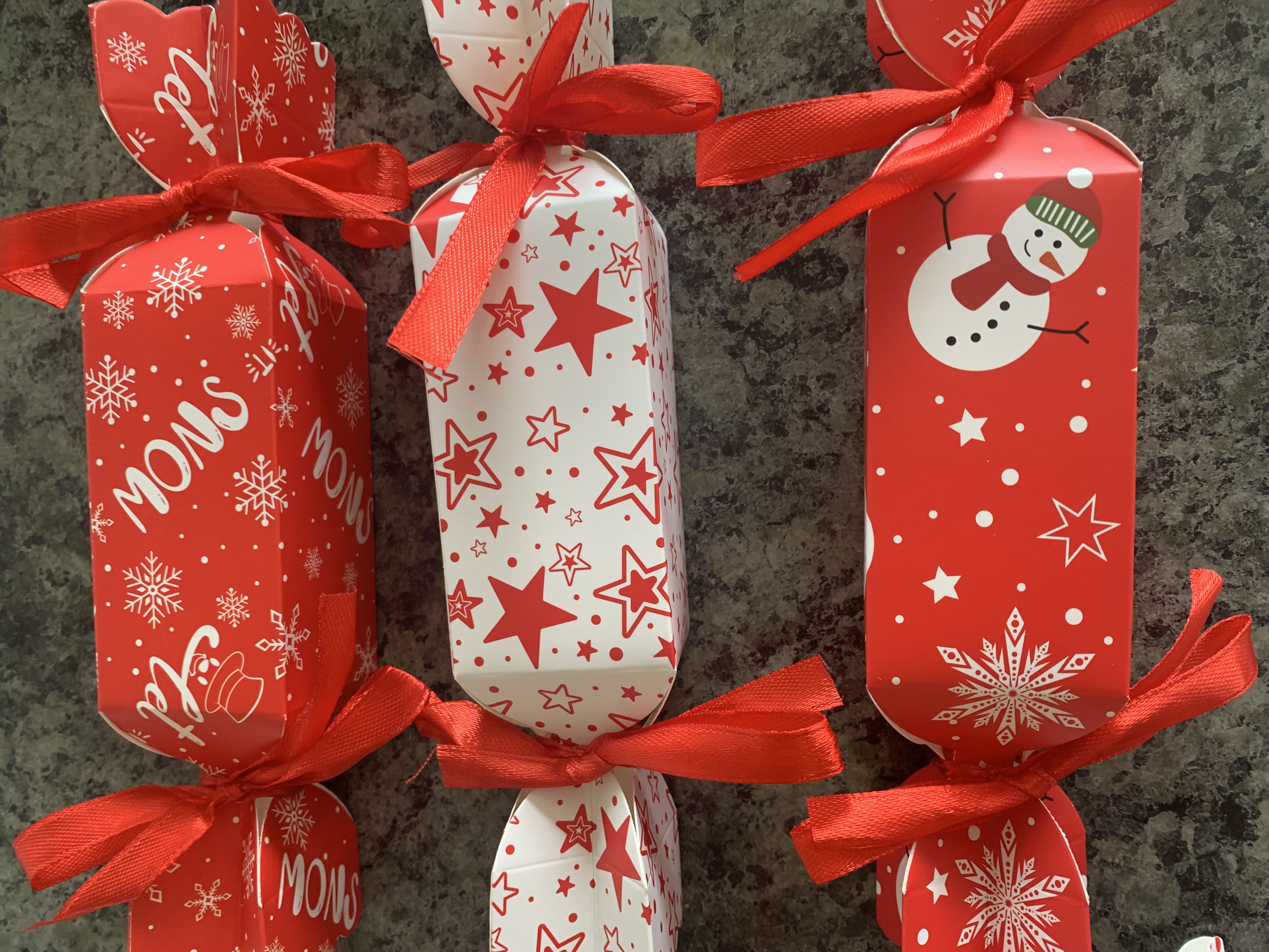 Cracker style christmas favour box complete with sweets and ribbon