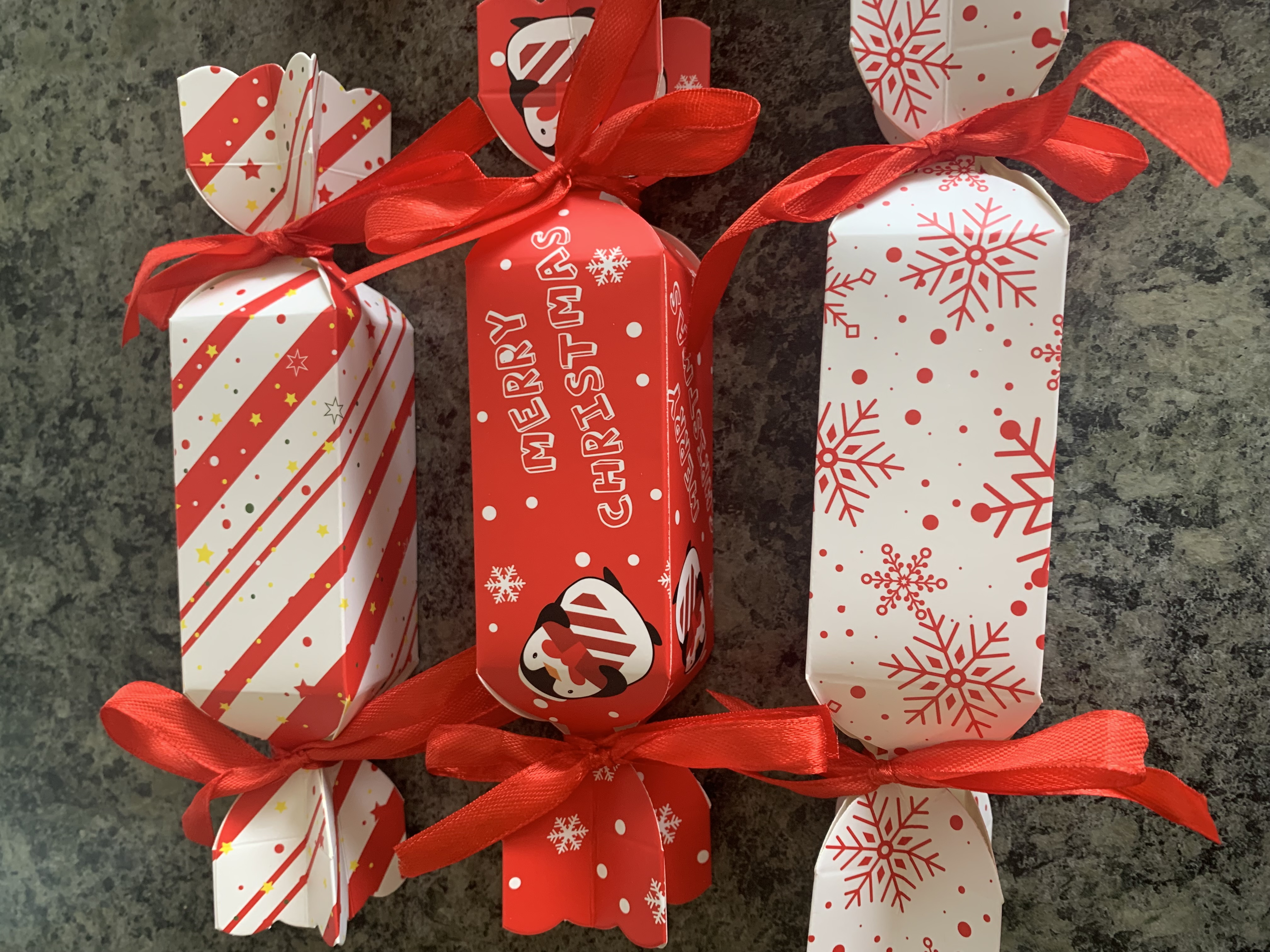 Cracker style christmas favour box complete with sweets and ribbon