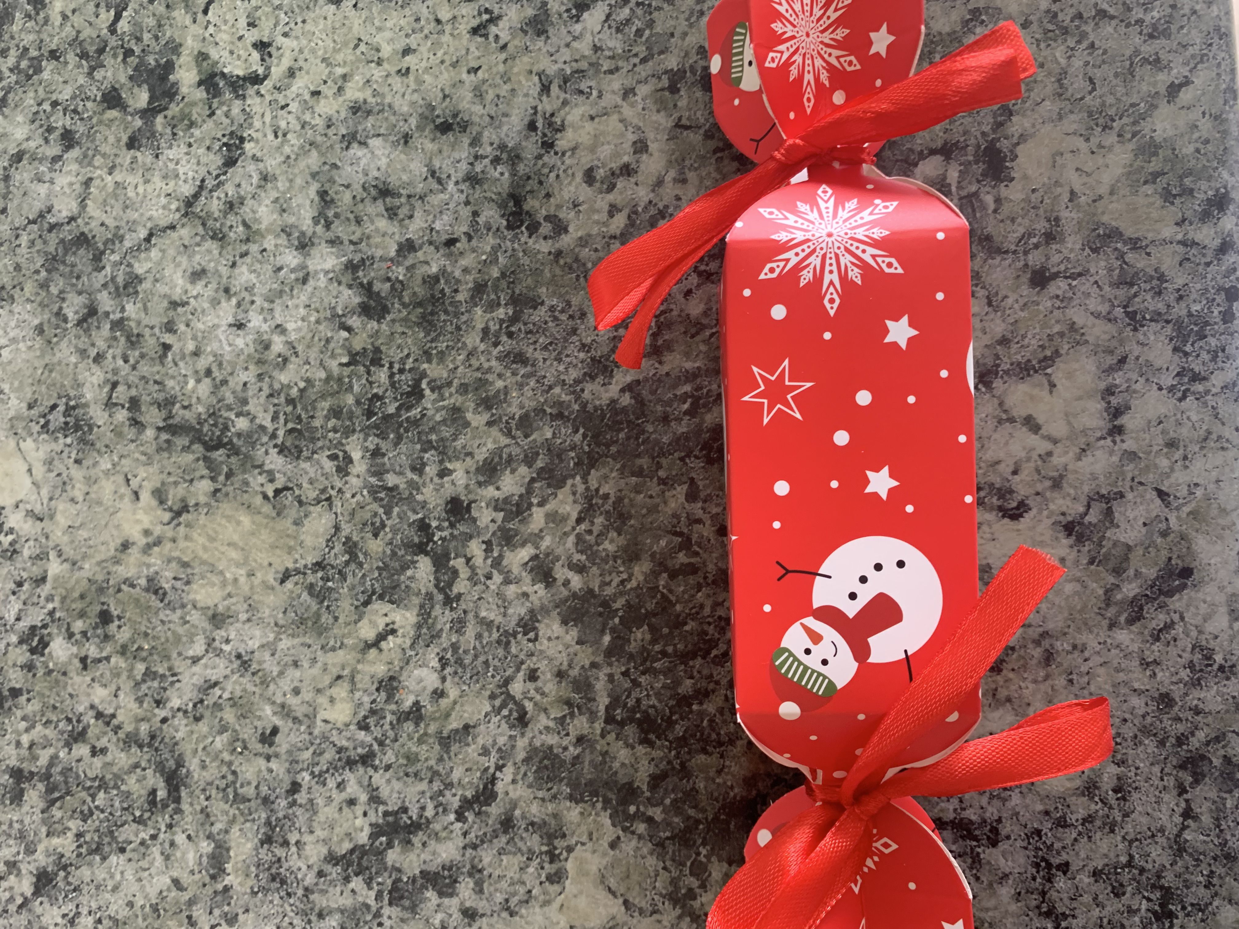 Cracker style christmas favour box complete with sweets and ribbon