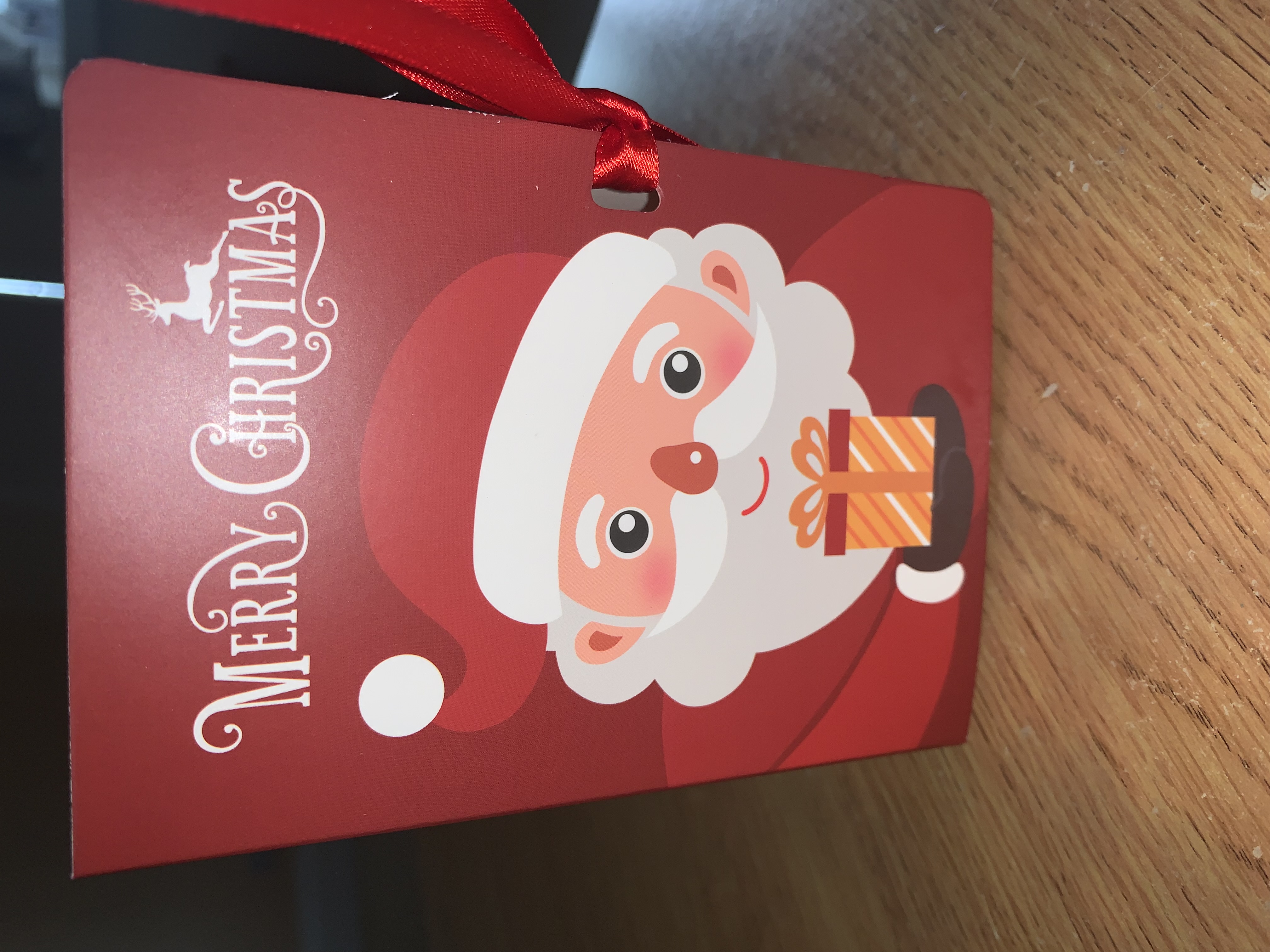 Red merry christmas book style favour box complete with your choice of pick n mix sweets or clotted cream or malteaser Fudge