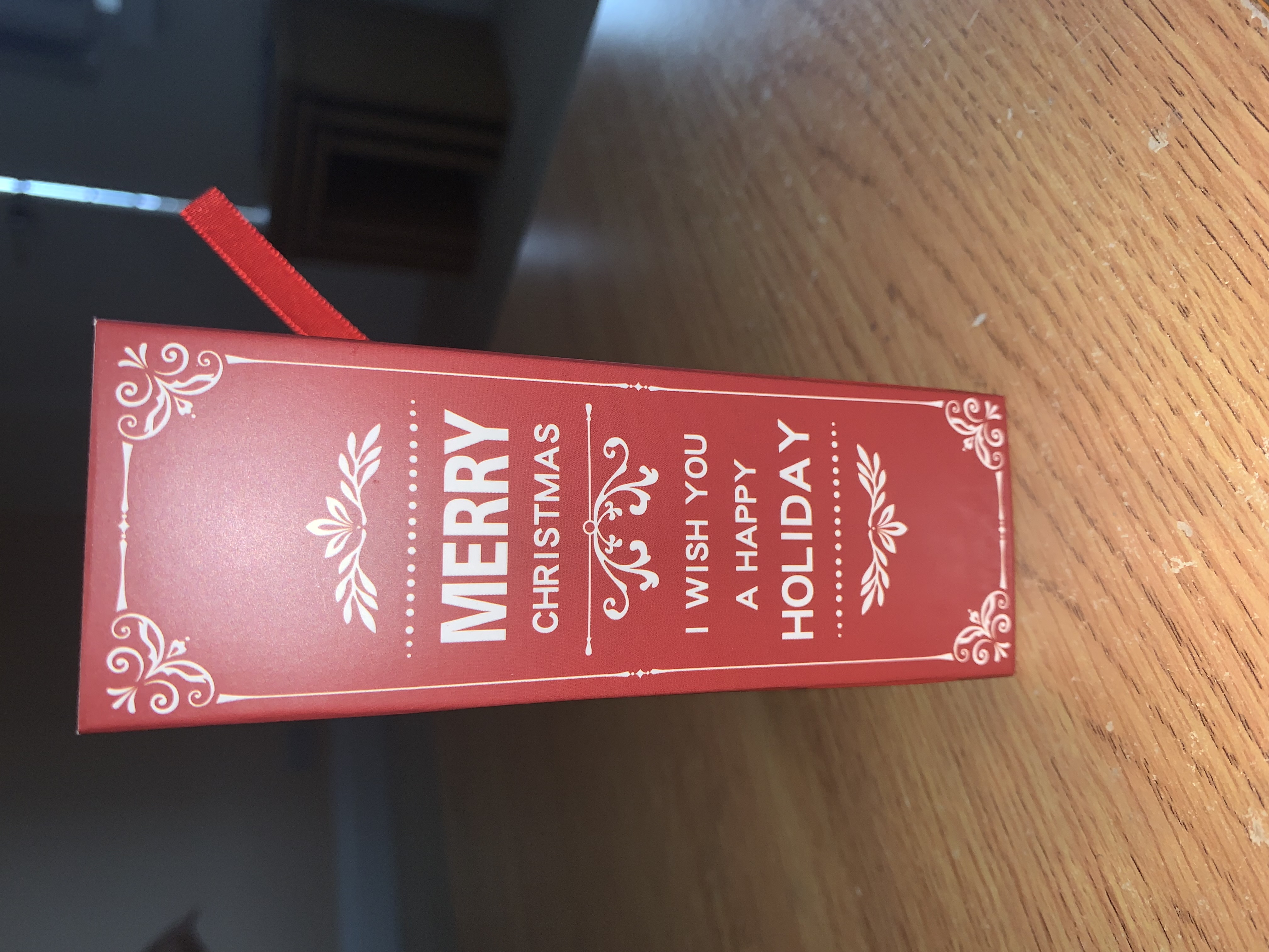 Red merry christmas book style favour box complete with your choice of pick n mix sweets or clotted cream or malteaser Fudge