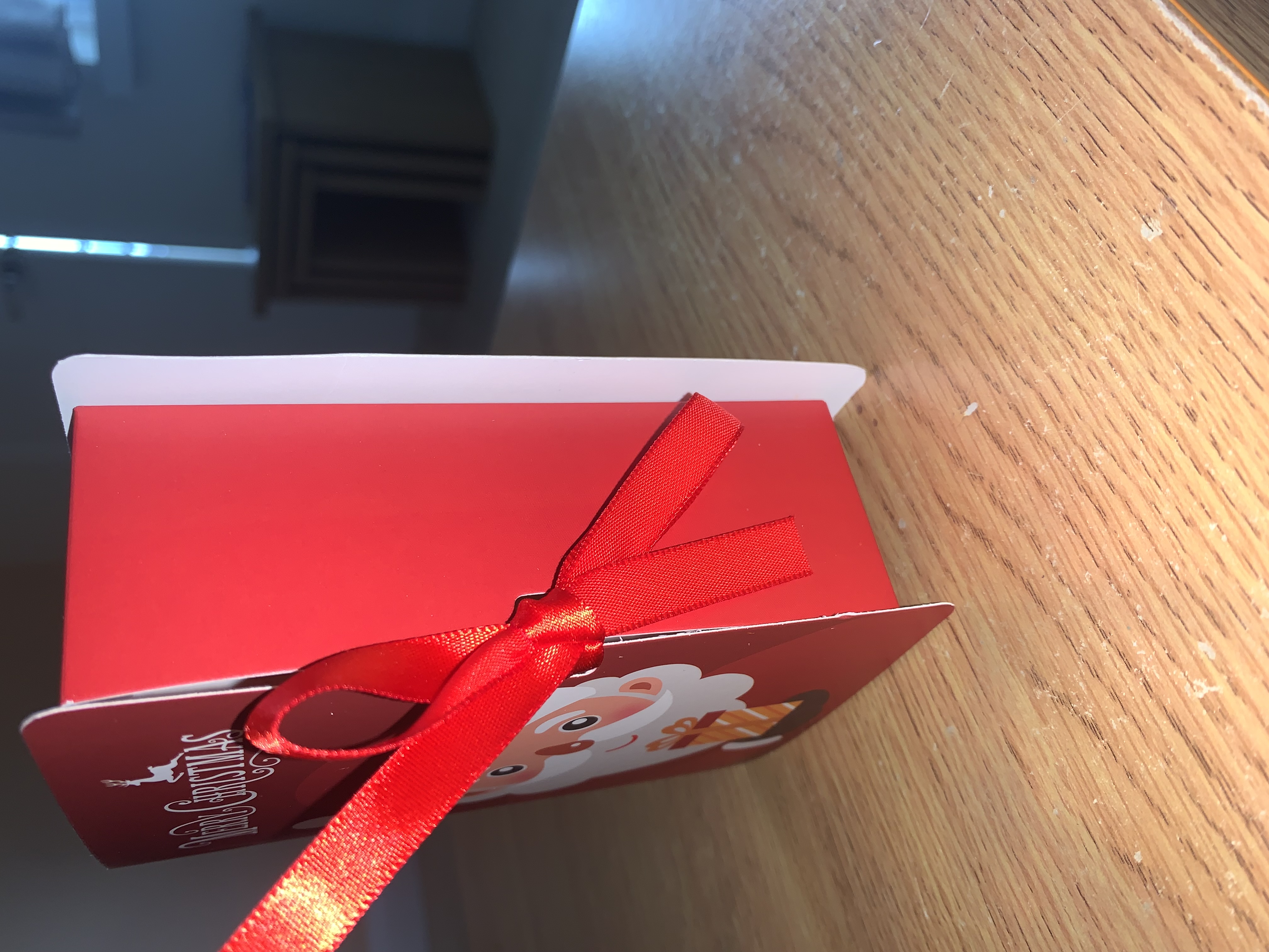 Red merry christmas book style favour box complete with your choice of pick n mix sweets or clotted cream or malteaser Fudge