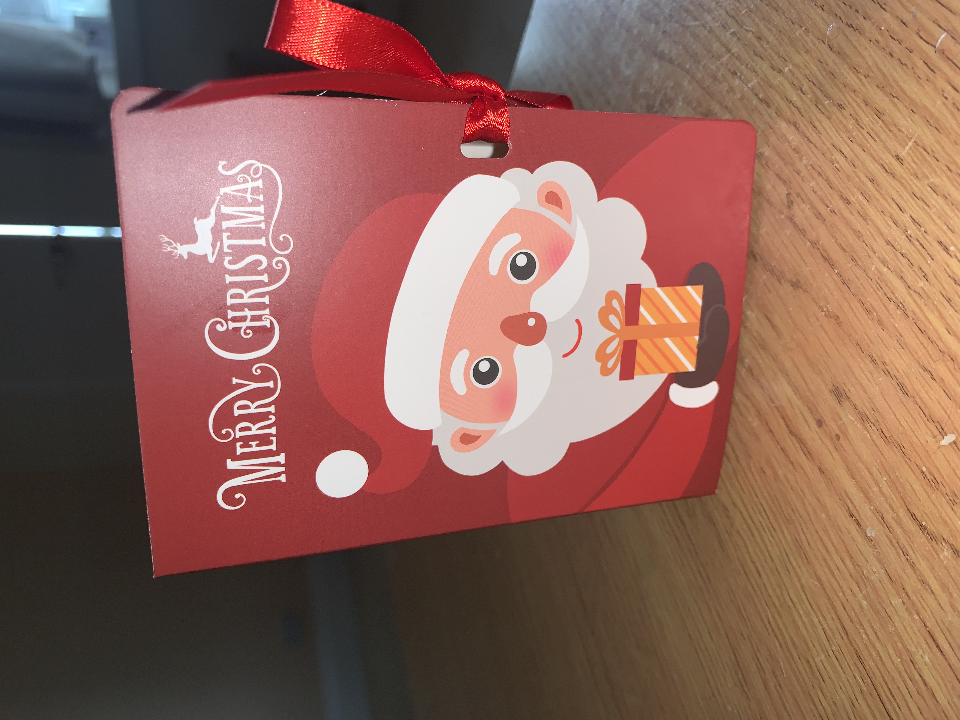Red merry christmas book style favour box complete with your choice of pick n mix sweets or clotted cream or malteaser Fudge