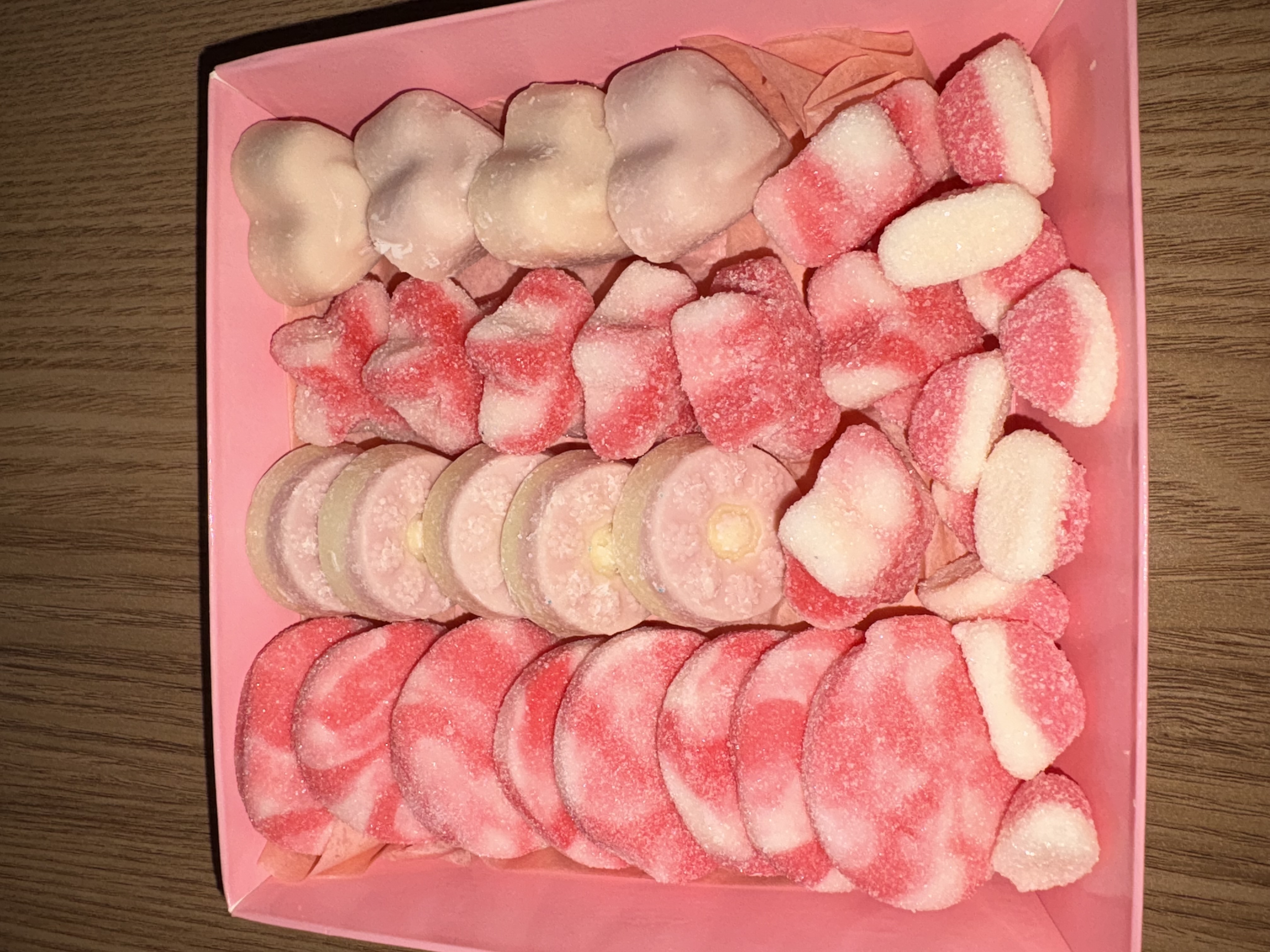 Square sweet box complete with a variety of sweets