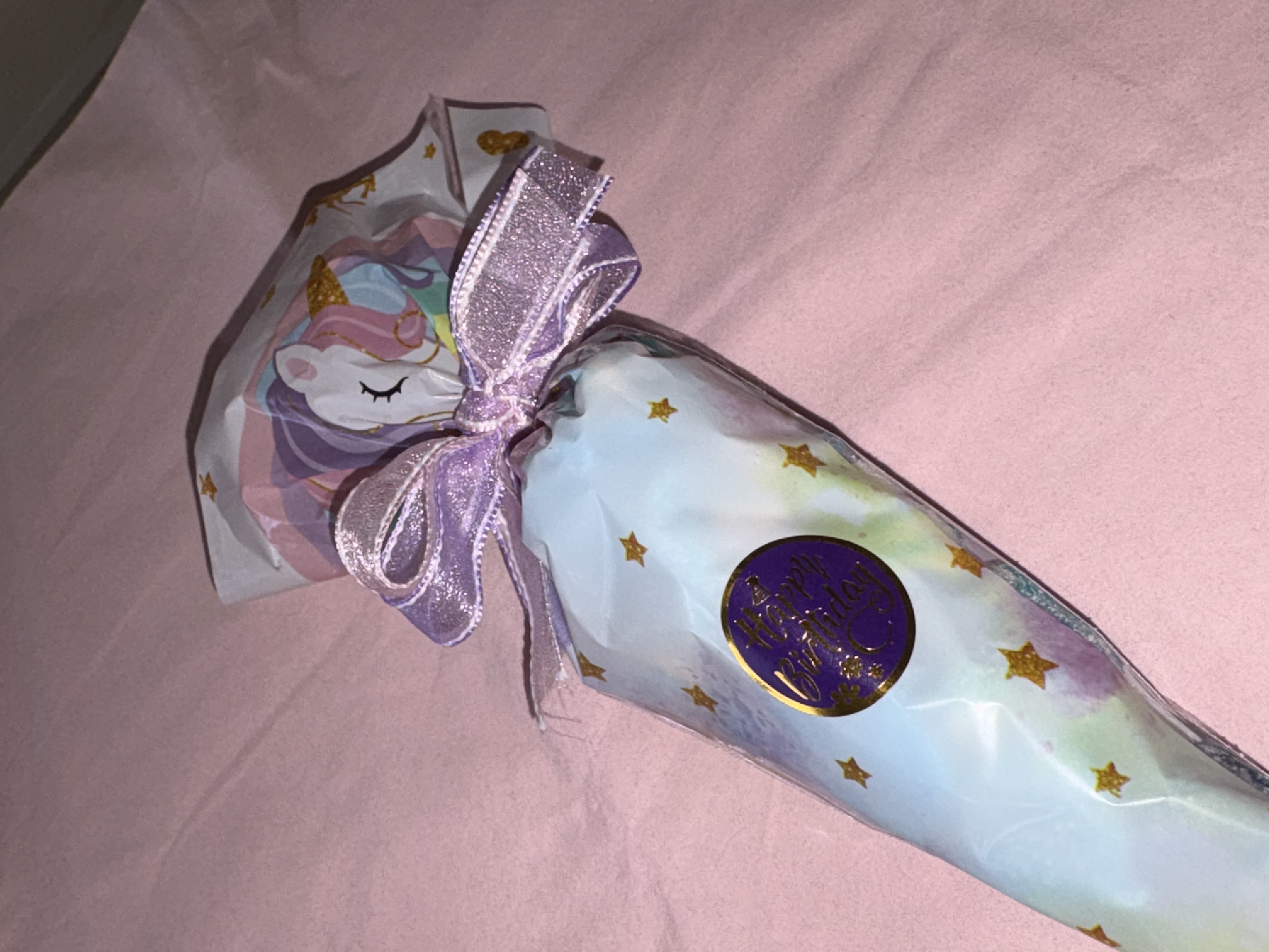 Unicorn Candy Cone complete with a variety of sweets and finished with a beautiful two tone organza ribbon