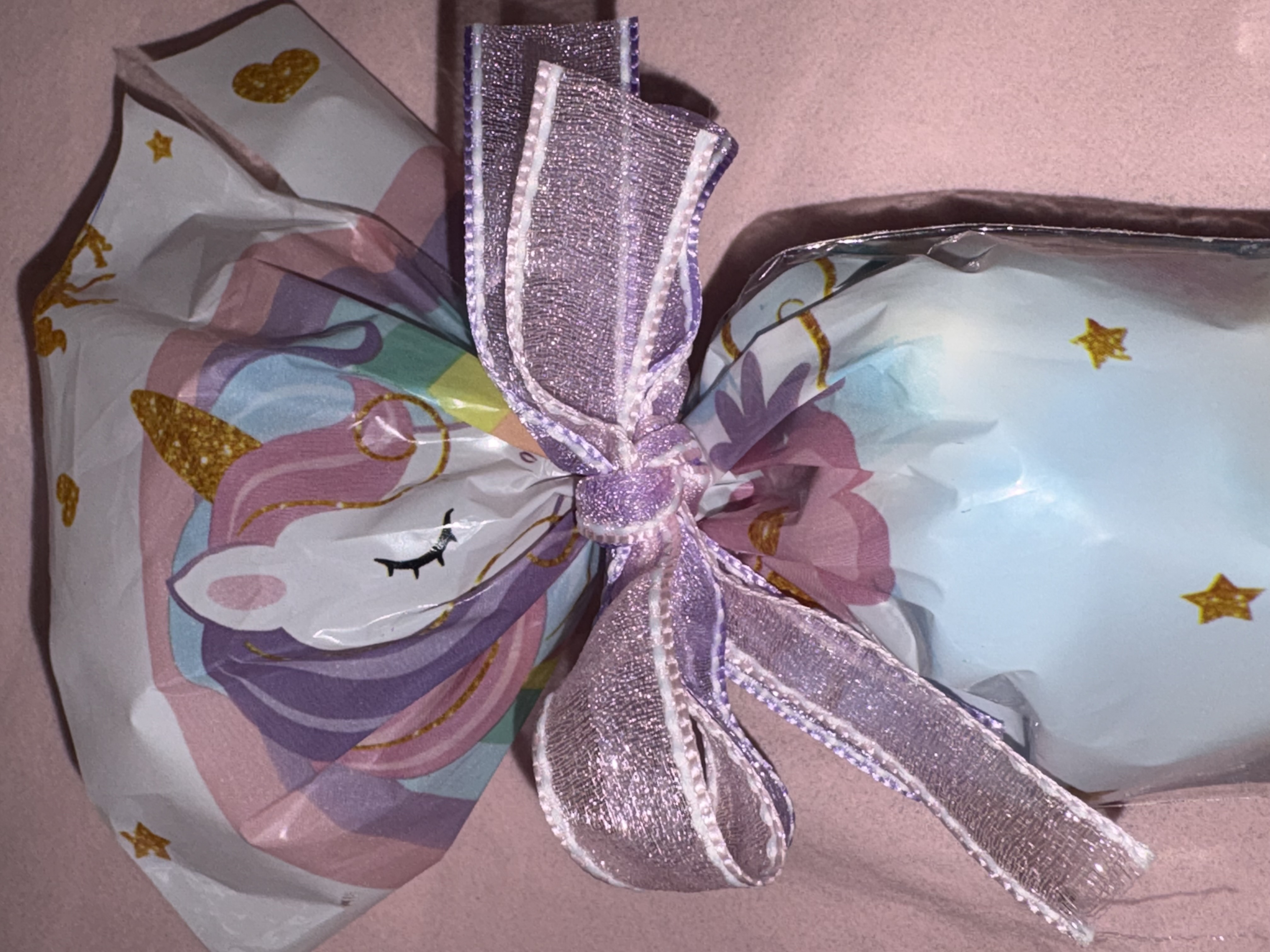 Unicorn Candy Cone complete with a variety of sweets and finished with a beautiful two tone organza ribbon