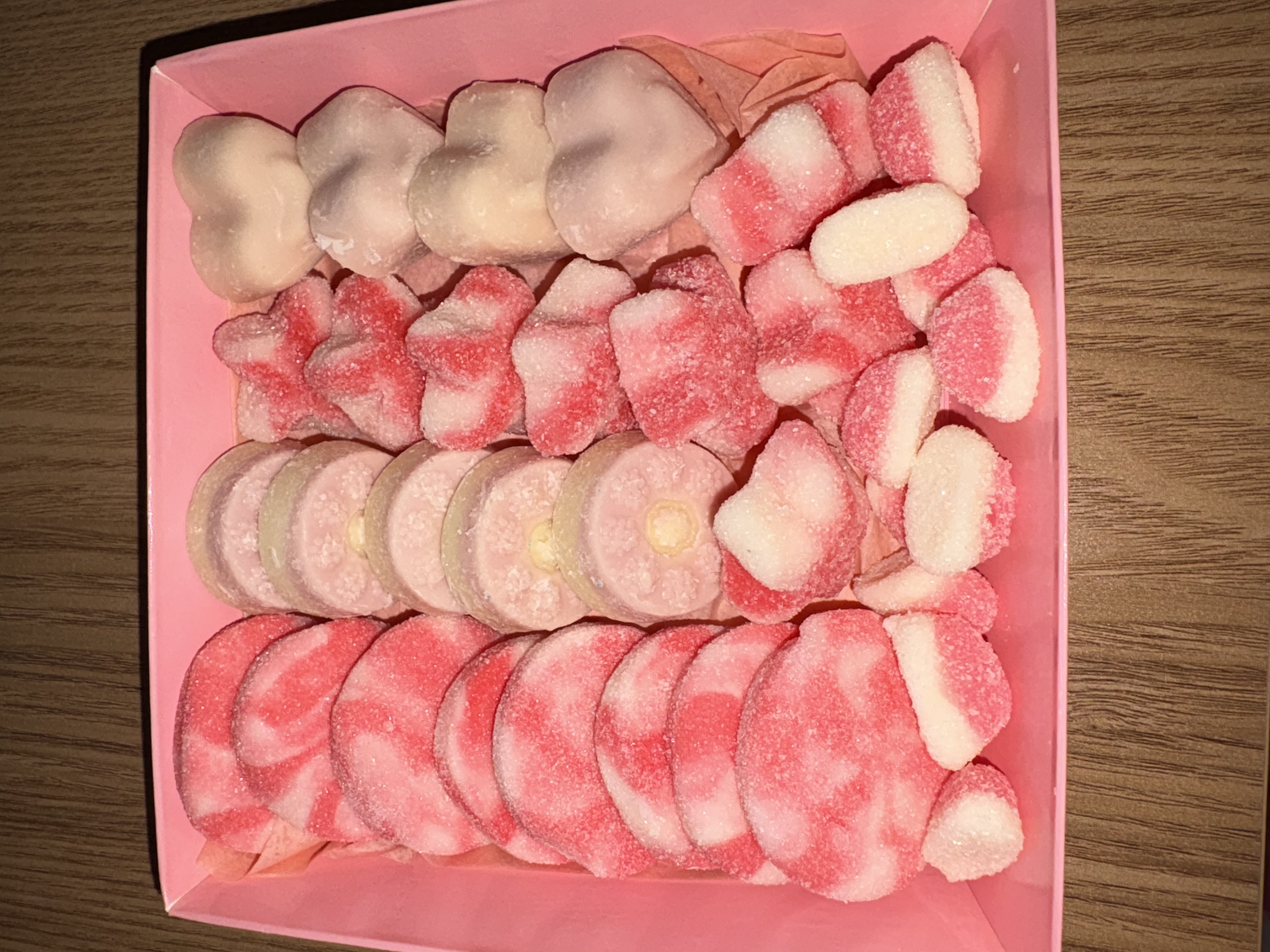 Square sweet box complete with a variety of sweets