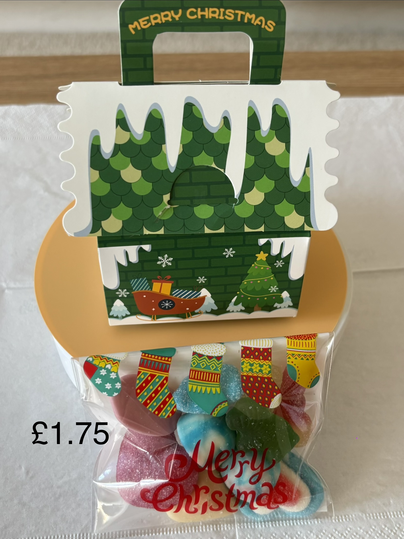 Cottage style christmas treat box complete with a variety of festive sweets.