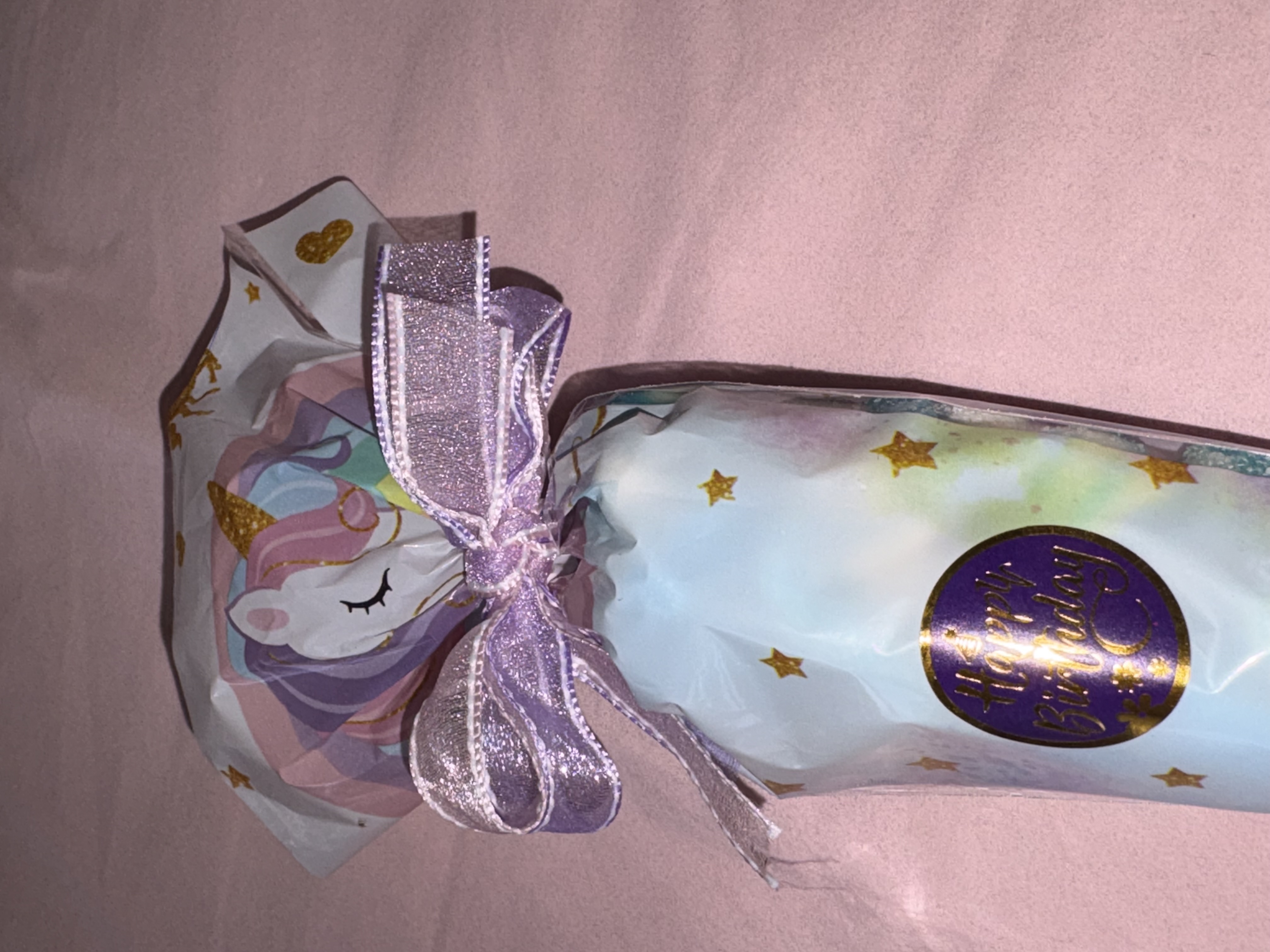 Unicorn Candy Cone complete with a variety of sweets and finished with a beautiful two tone organza ribbon