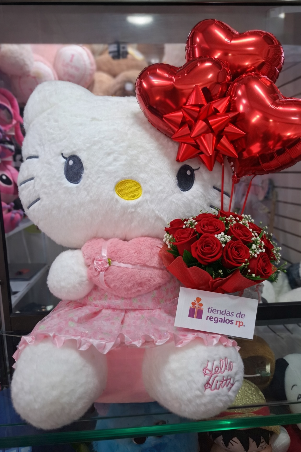 Peluchito gatita lazo rosa
