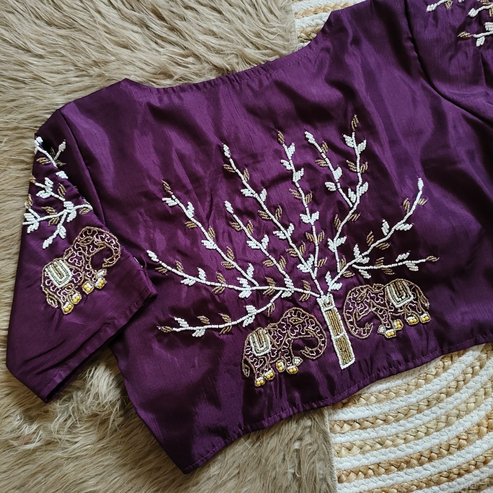  handcrafted work in sleeves and back all over blouse