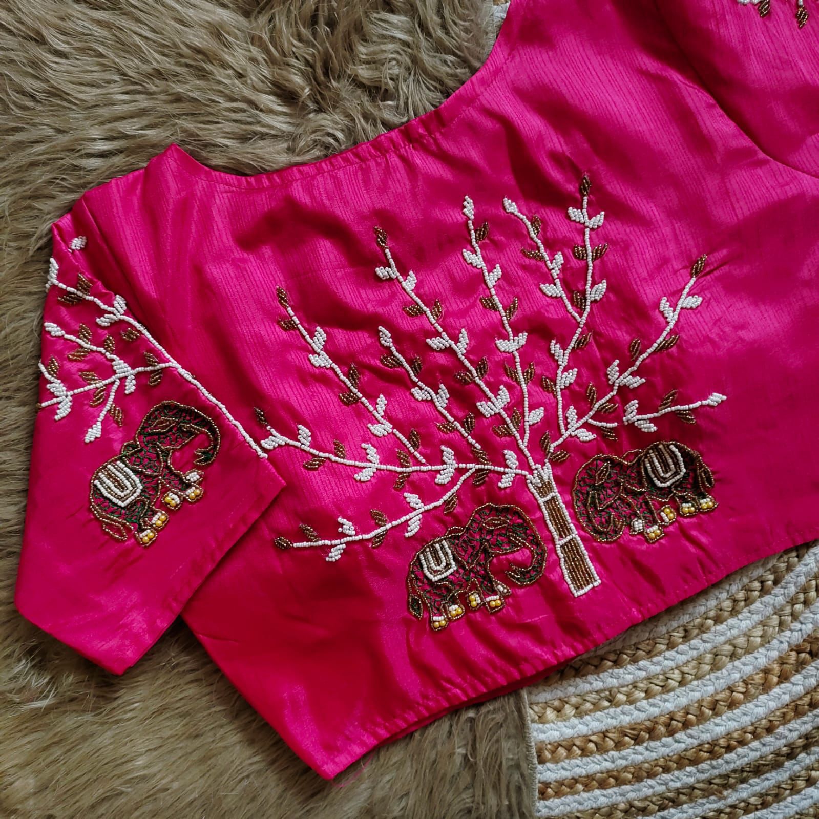  handcrafted work in sleeves and back all over blouse