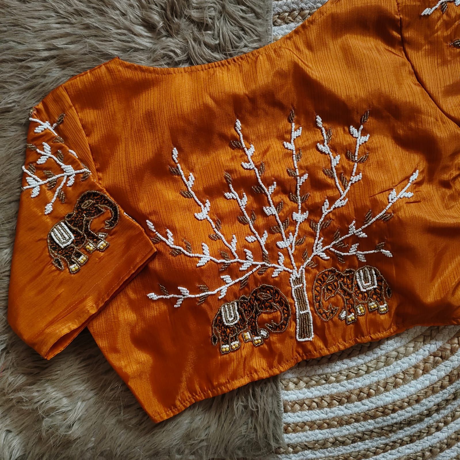  handcrafted work in sleeves and back all over blouse