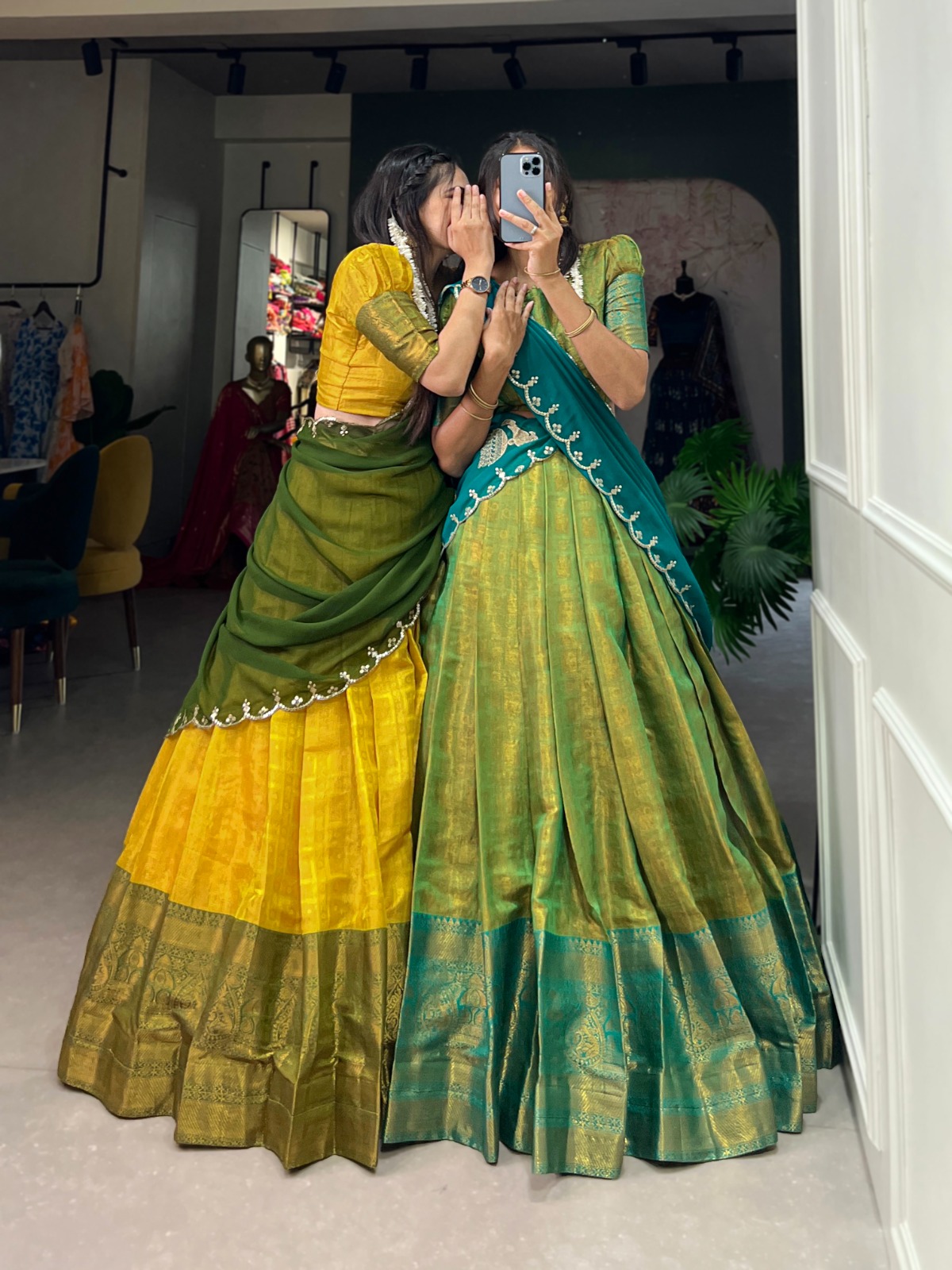 Experience the luxury of Kanjivaram silk in this regal lehenga choli ensemble, completed with a flowing embroidery dupatta.