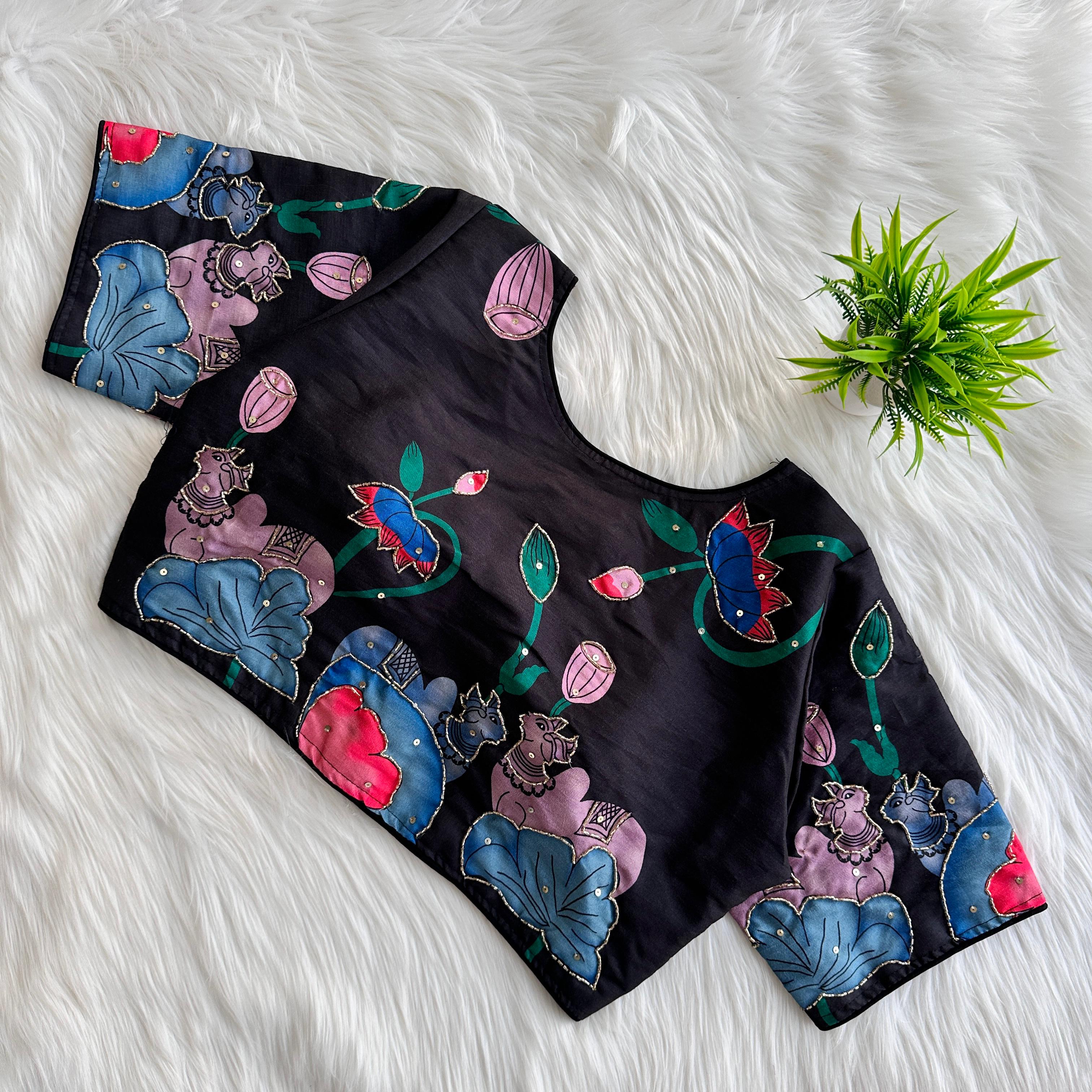 Pure silk fabric with Decent print all over blouse with antique handcrafted work