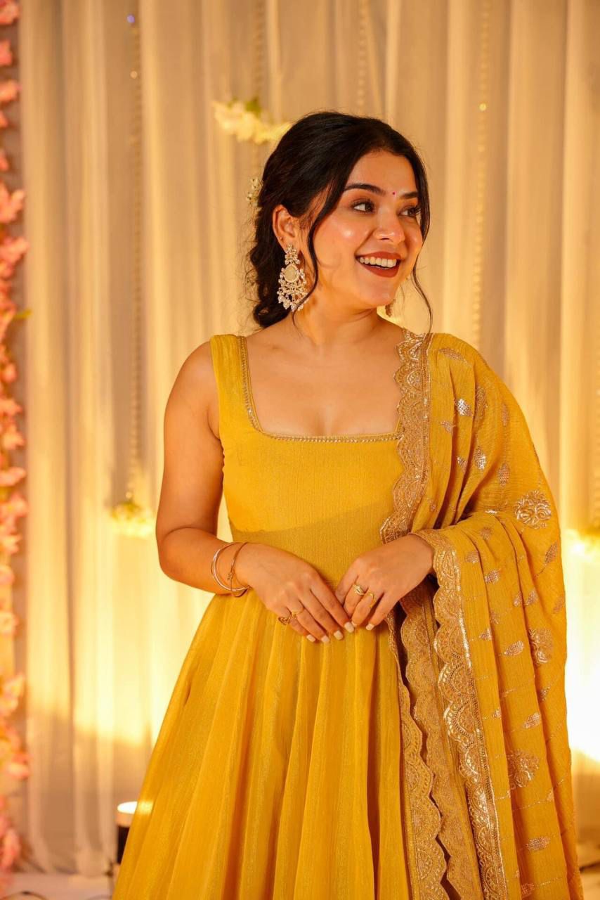 Unveiling our stunning yellow floor-length maxi in Chinnon Fabric, paired with an intricately embroidered dupatta