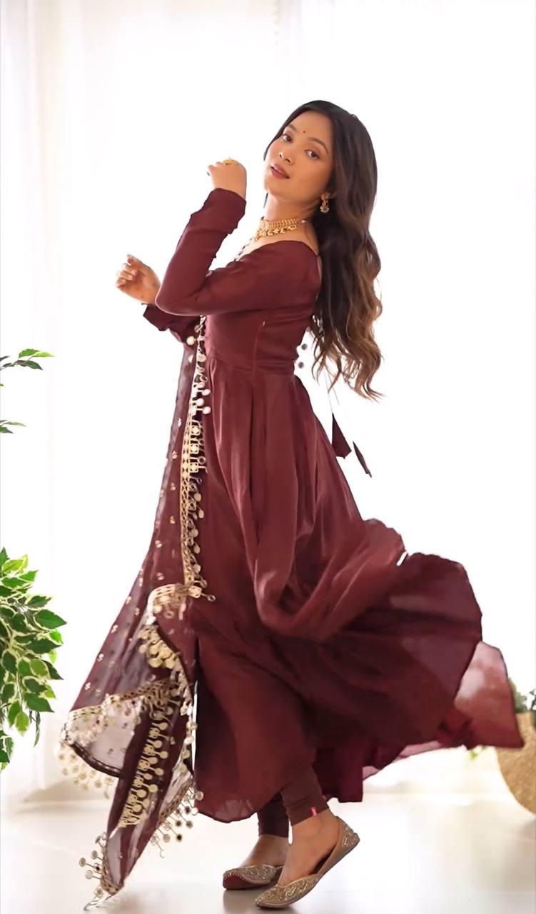 This Beautiful  Long Anarkali Dress features a luxurious Shine of Chinnon for an elegant look with a hint of glamour. The perfect choice for any special occasion, this sumptuous dress is sure to make an impression.