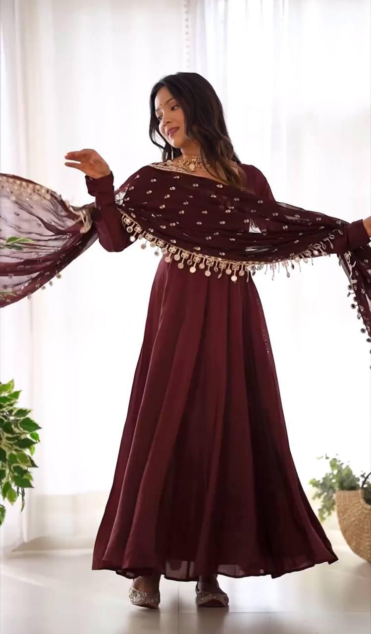 This Beautiful  Long Anarkali Dress features a luxurious Shine of Chinnon for an elegant look with a hint of glamour. The perfect choice for any special occasion, this sumptuous dress is sure to make an impression.