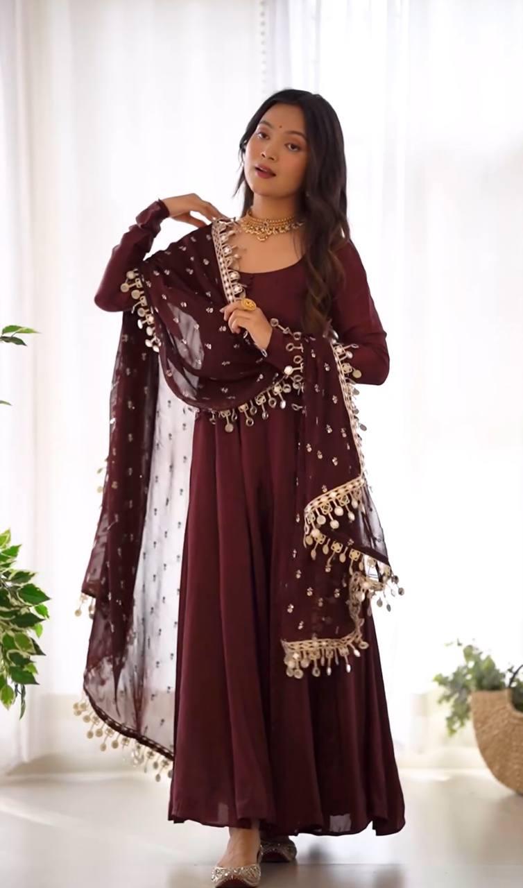 This Beautiful  Long Anarkali Dress features a luxurious Shine of Chinnon for an elegant look with a hint of glamour. The perfect choice for any special occasion, this sumptuous dress is sure to make an impression.