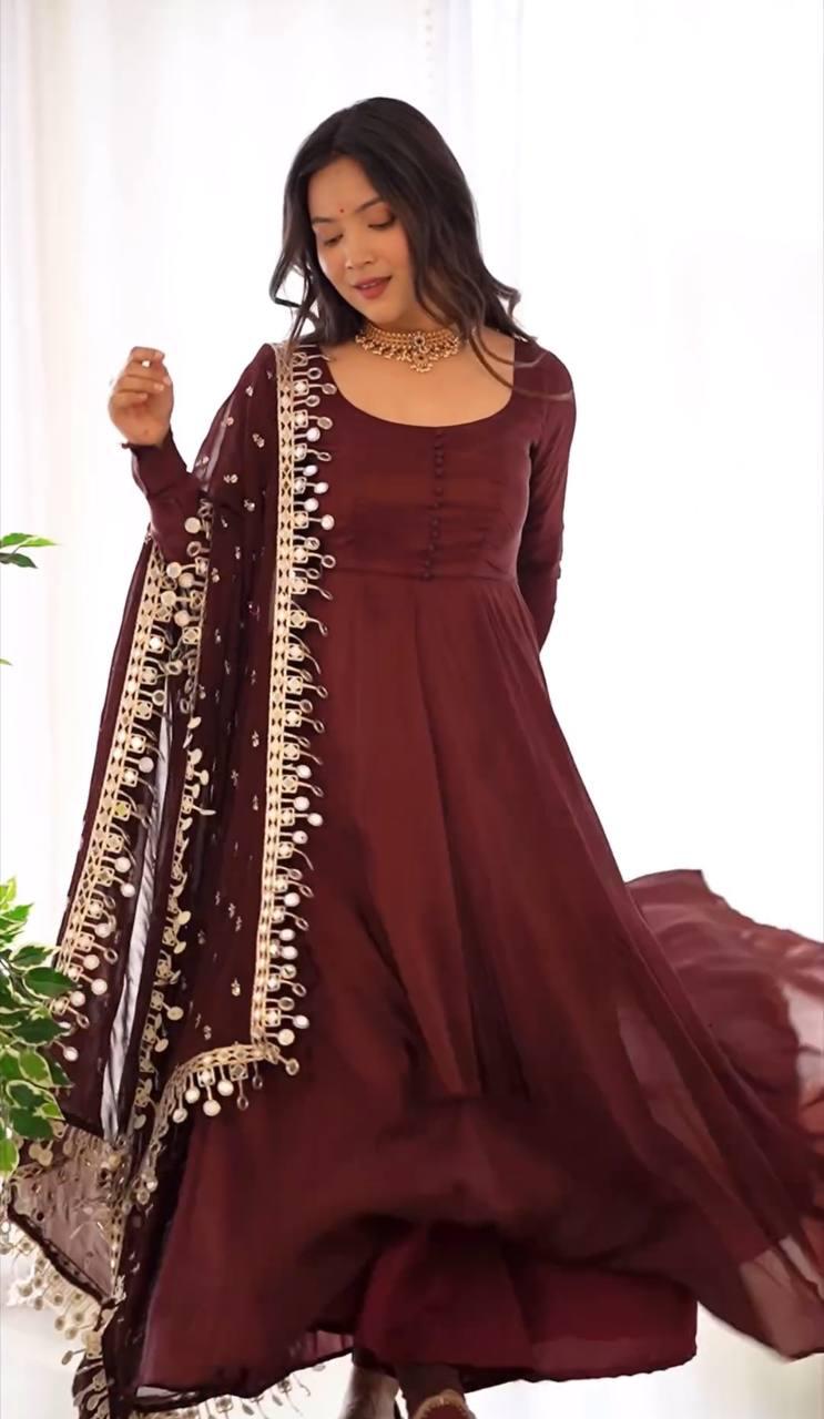 This Beautiful  Long Anarkali Dress features a luxurious Shine of Chinnon for an elegant look with a hint of glamour. The perfect choice for any special occasion, this sumptuous dress is sure to make an impression.