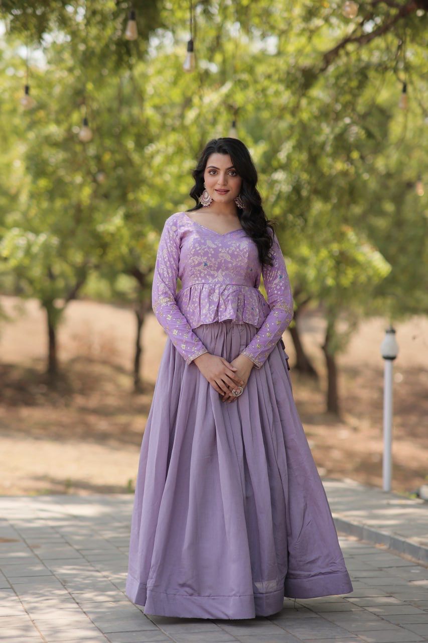Explore This Trending Fashionable Co-ord  Set with Pure Viscose Dayble Flower Design & Sequins Embroidered work Blouse and Plain Lehenga Which looks Amazing for Any Functions.