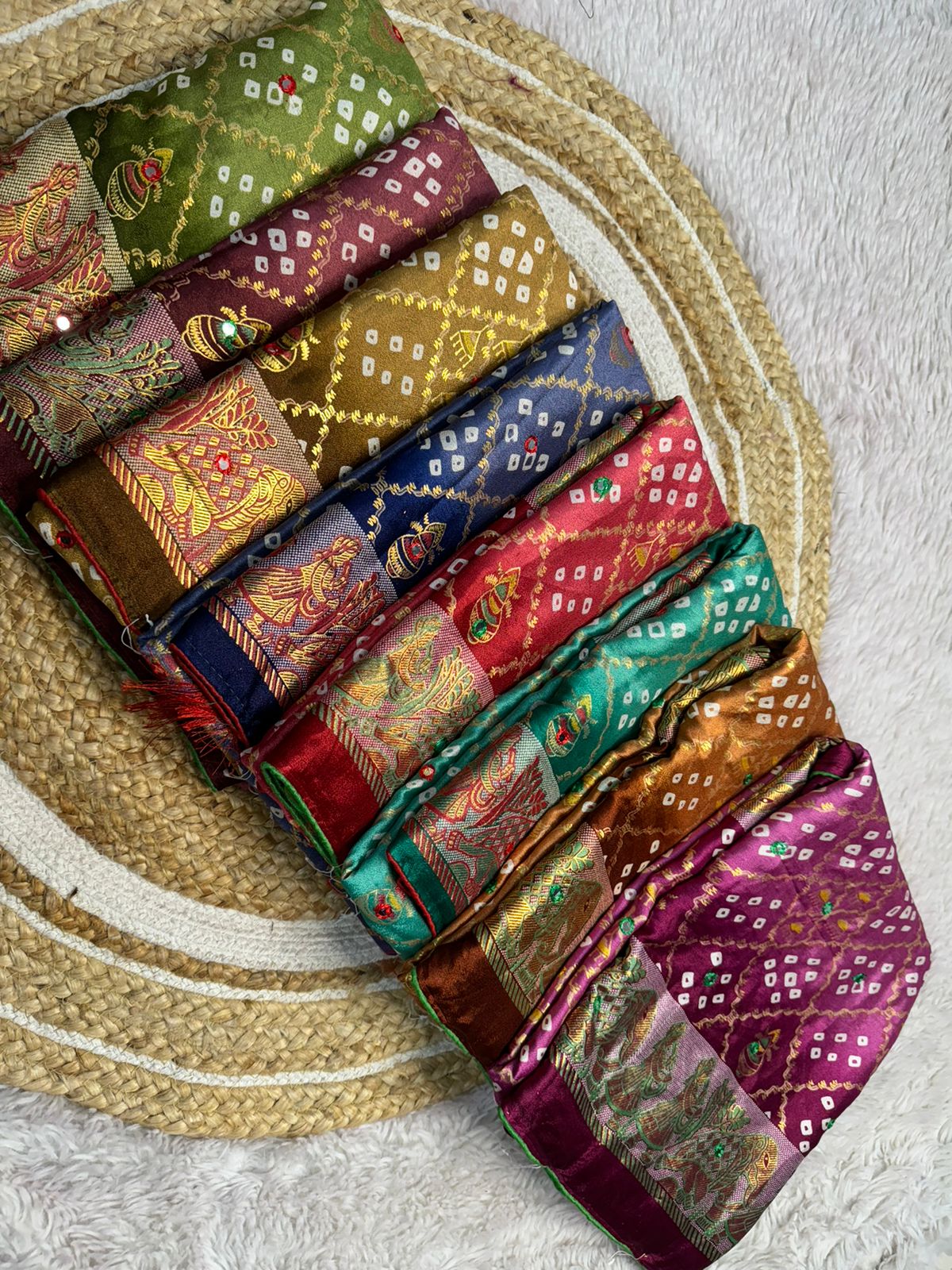 Beautiful premium quality chiffon bandhini sarees with all over bandhini print along with foil mirror cut work border  Contrast pallu