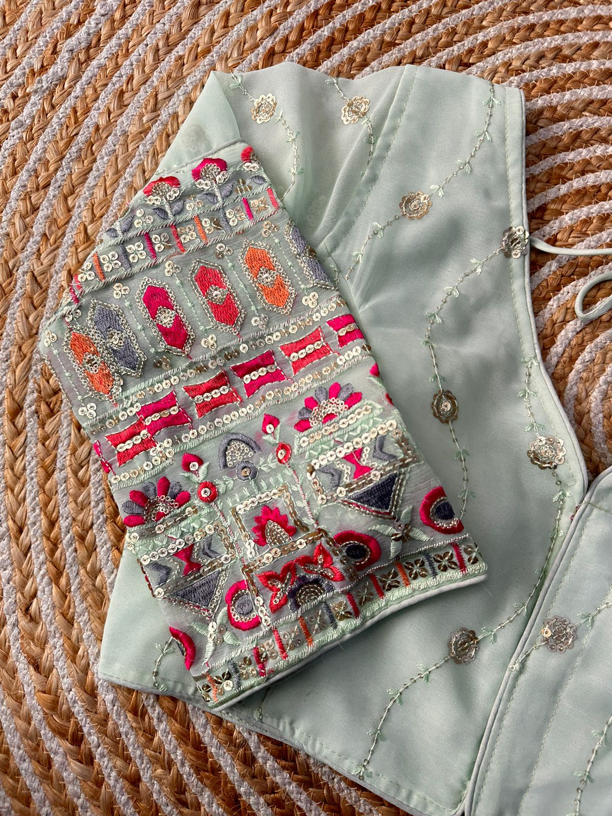 Beautiful sequence work with tone to tone thread all over blouse