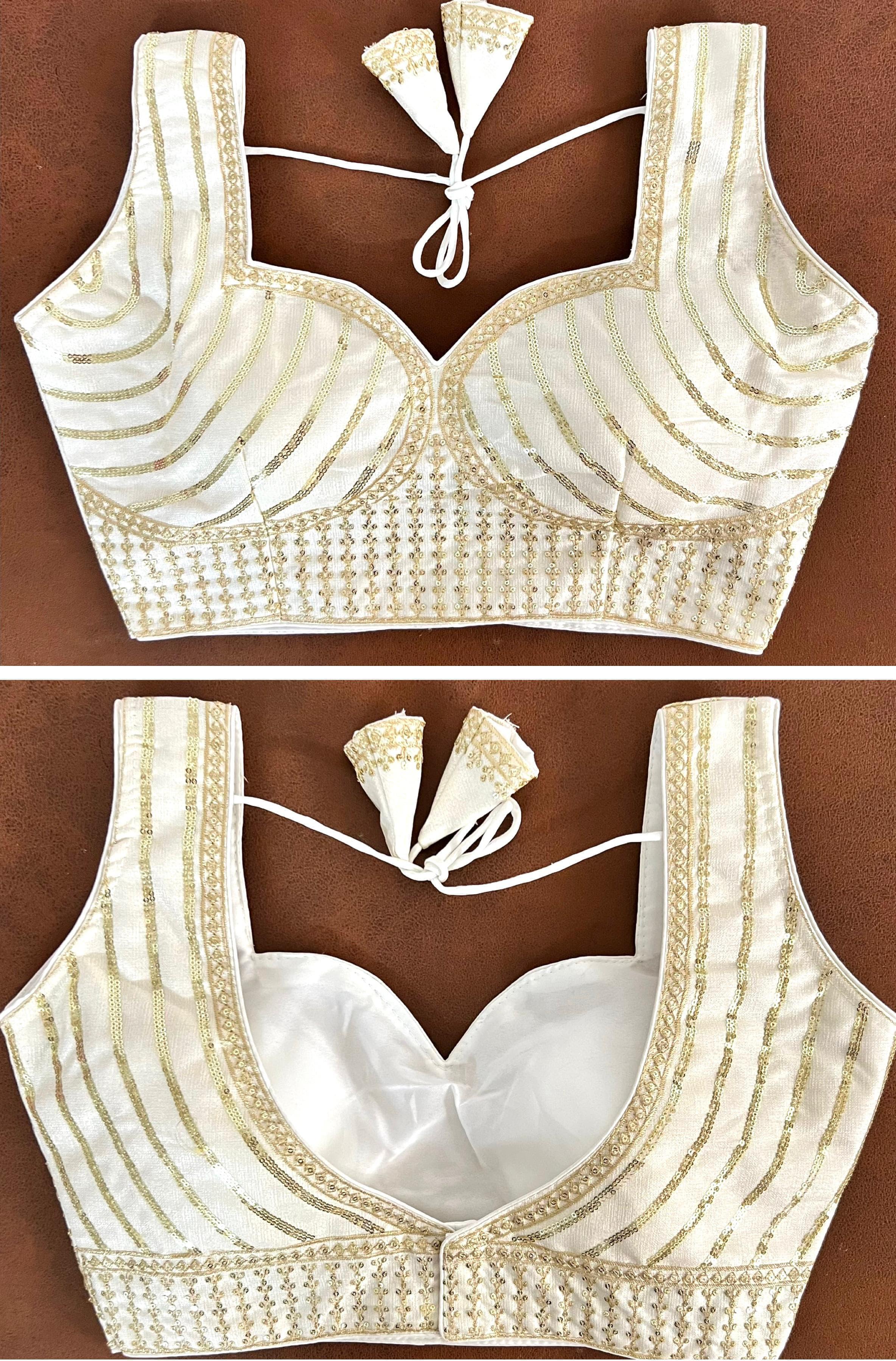 Blouse has sequance , jari and thread work