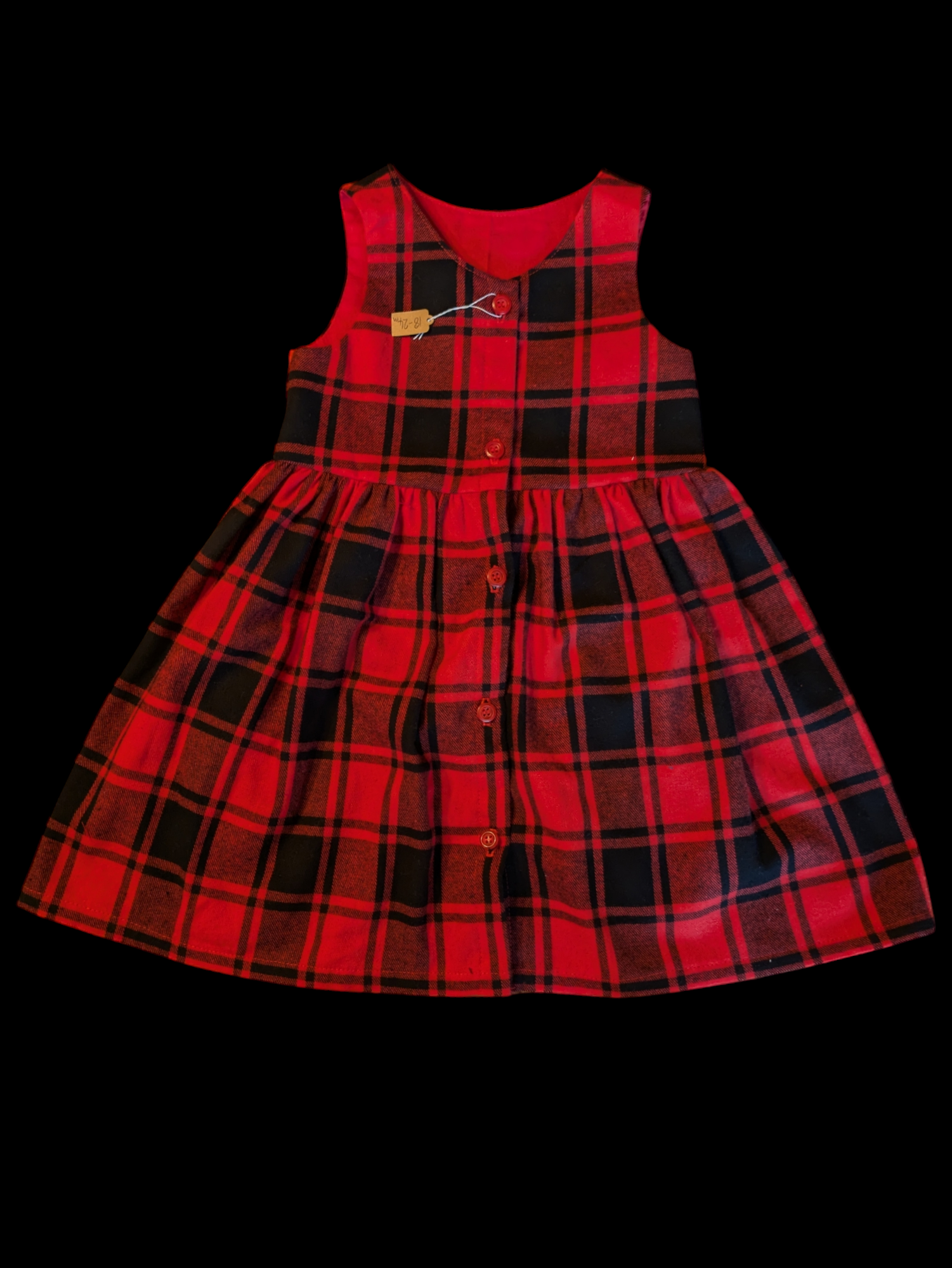 Red check with buttons down the front 1-2y