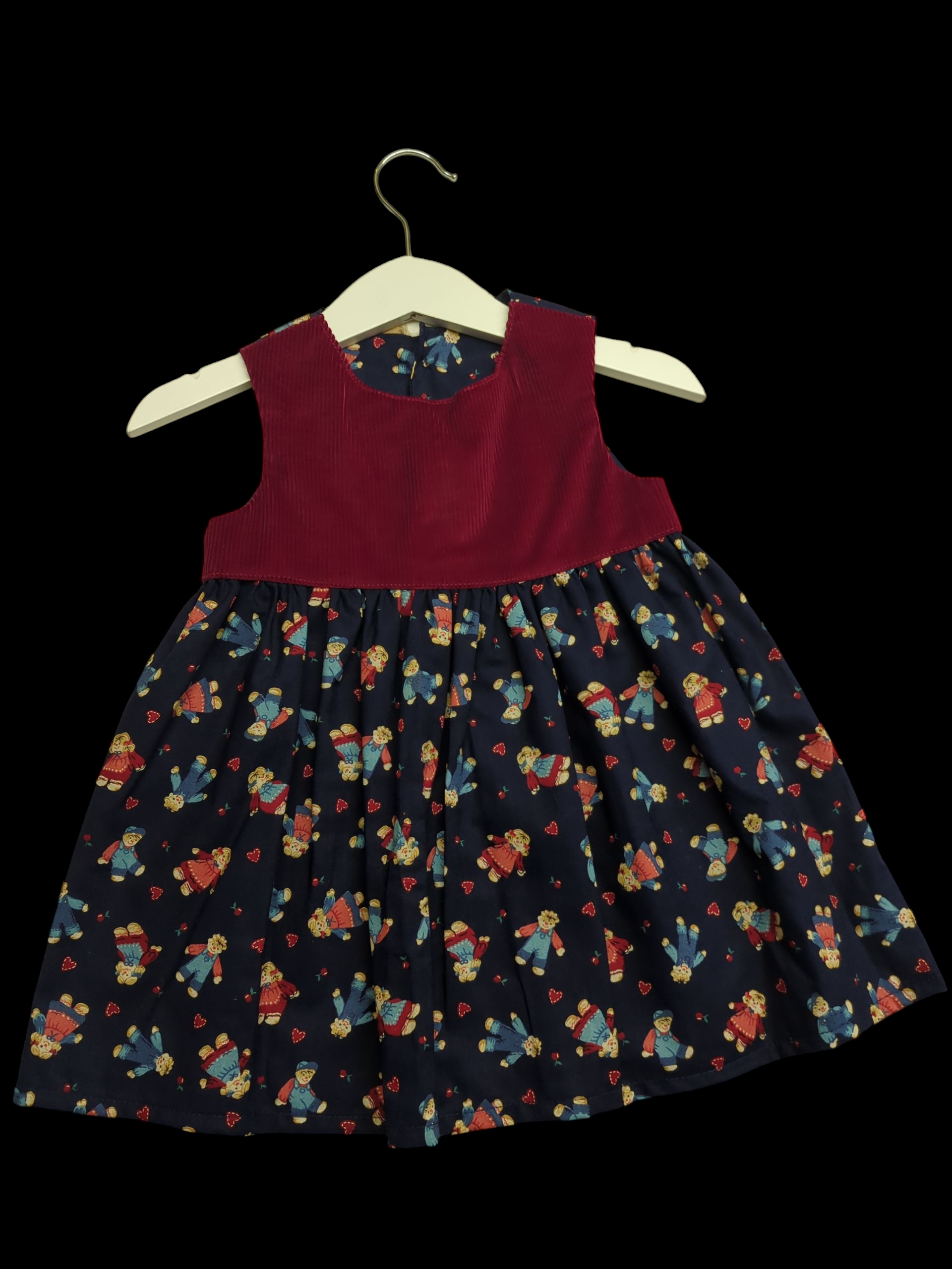 Red cord with dolls skirt up to 6m